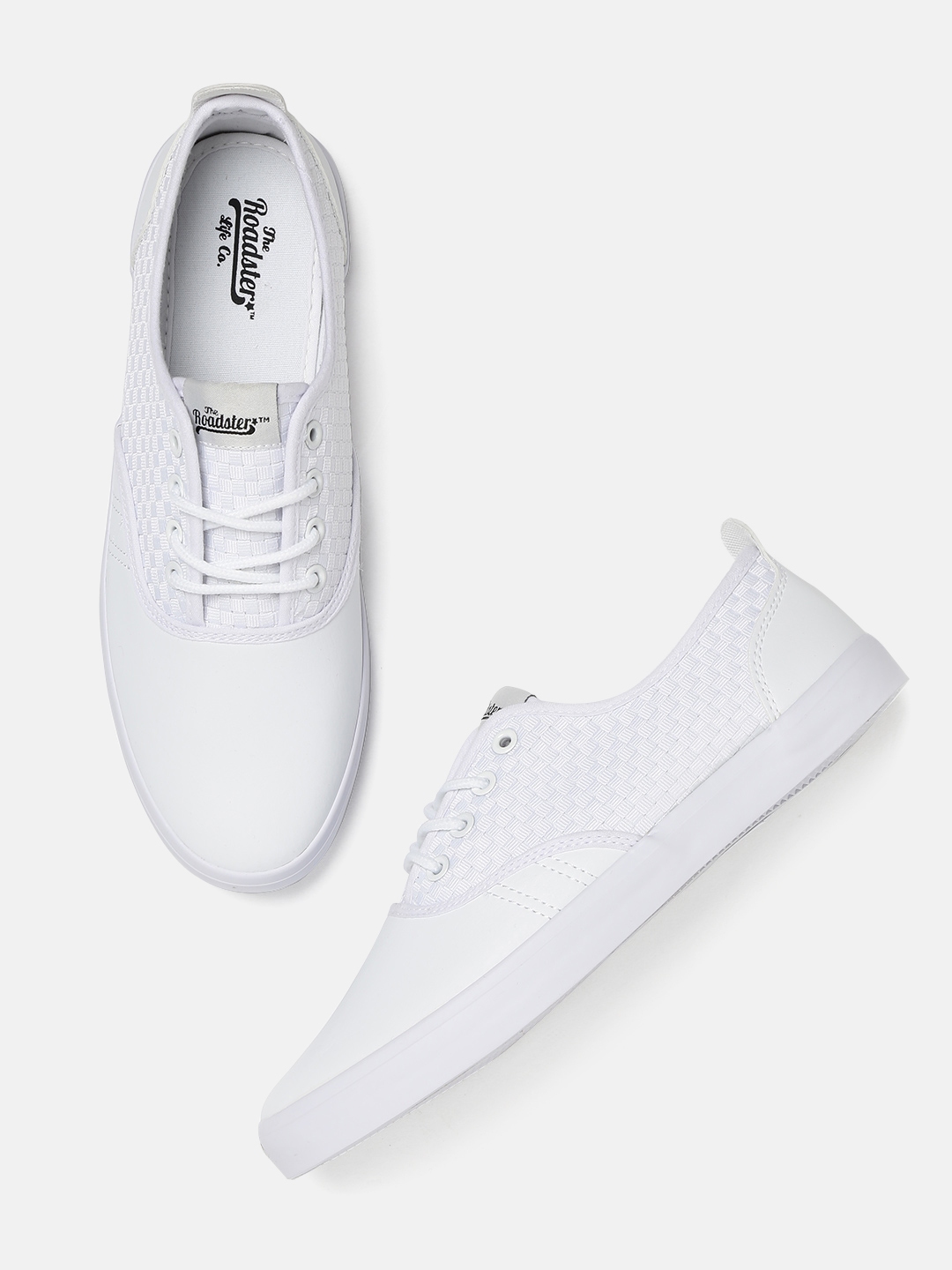 ucb white sneakers myntra