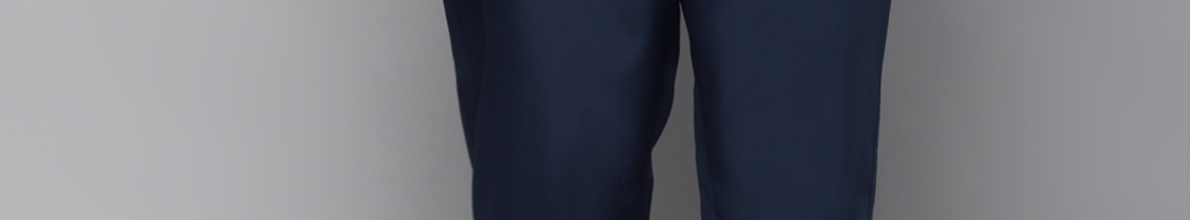 Buy Reebok Men Navy Blue Solid Track Pants - Track Pants for Men ...