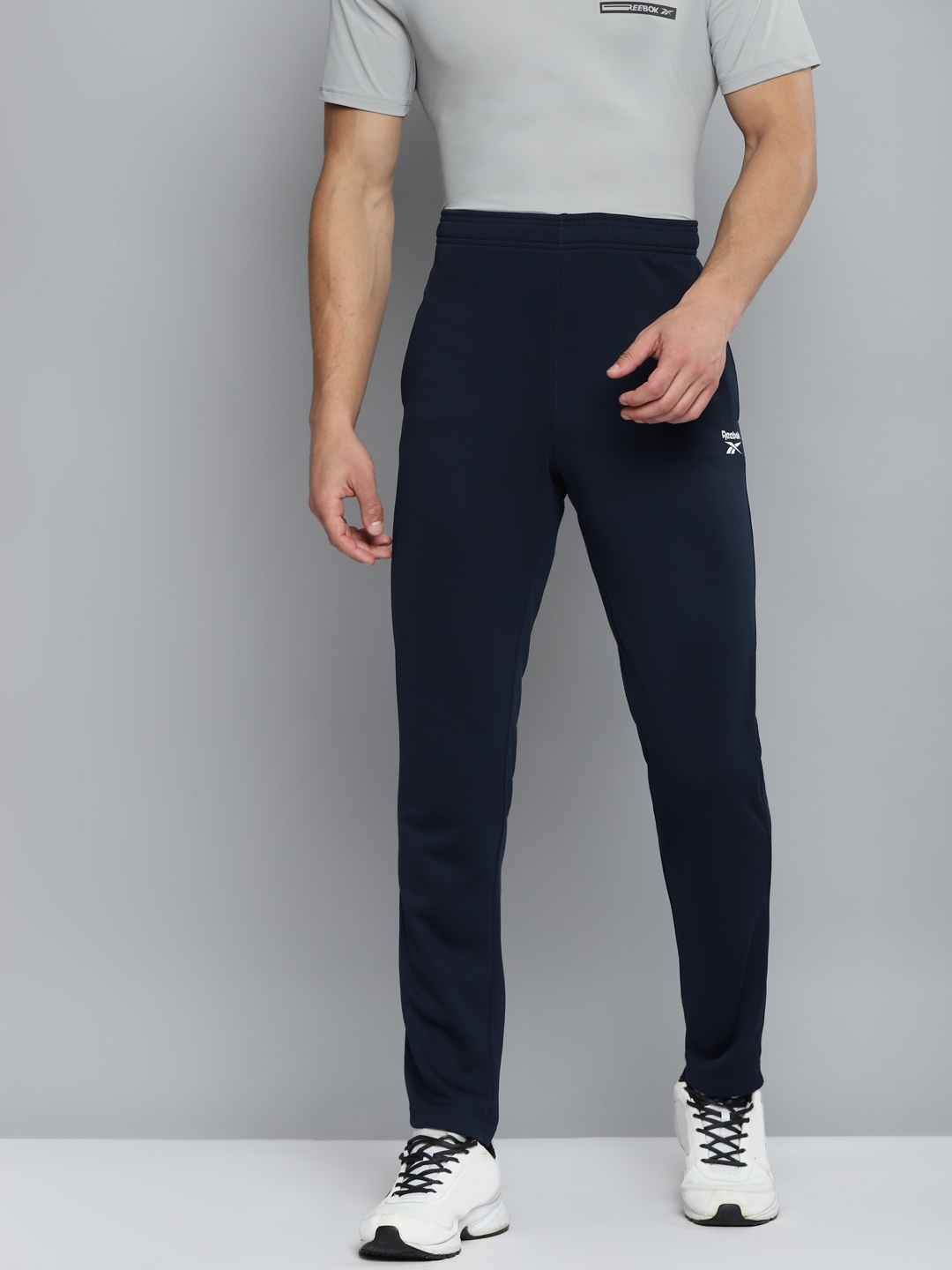 Buy Reebok Men Navy Blue Solid FND Speedwick Training Track Pants ...