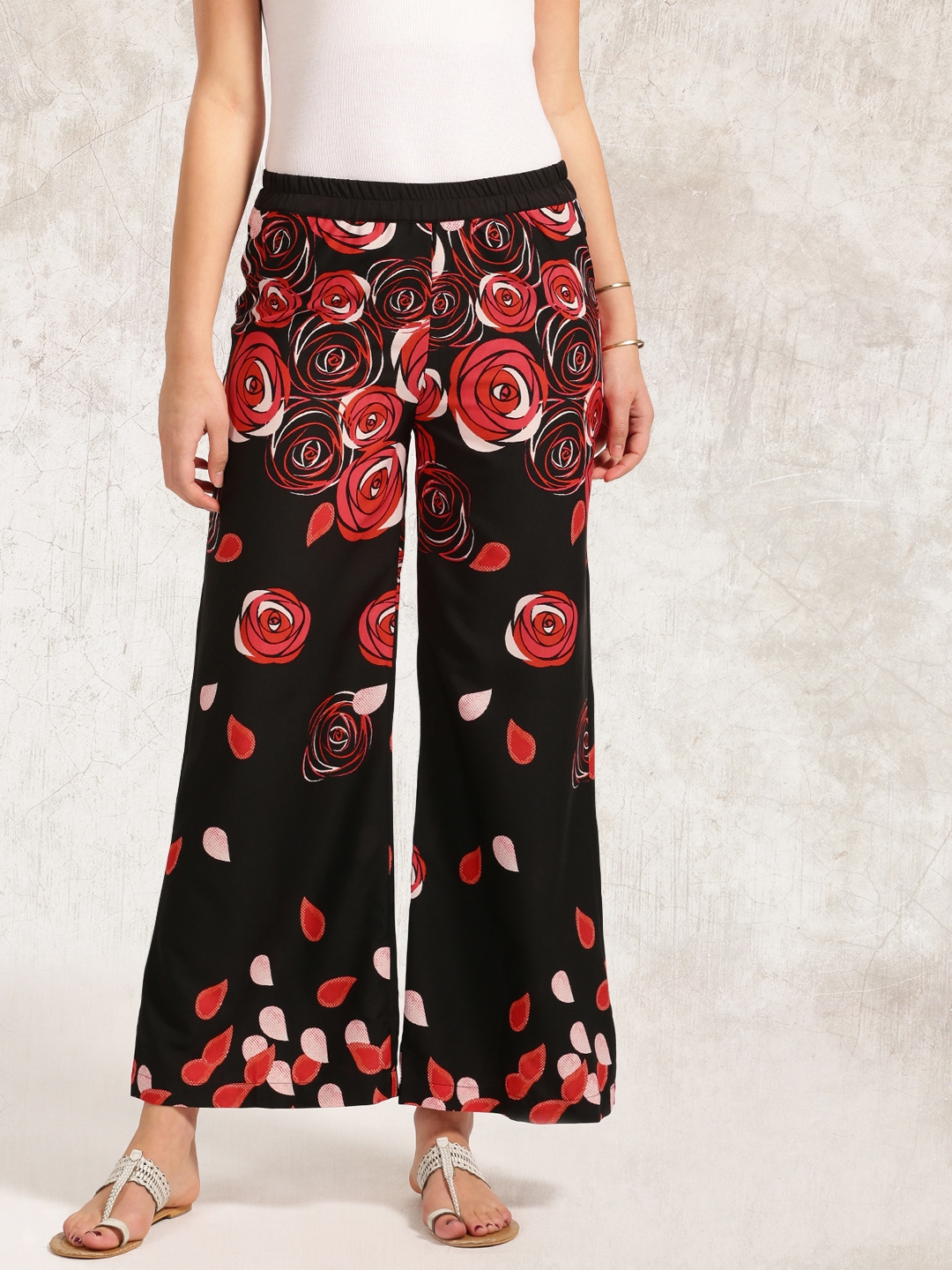 black trousers with red and white stripe