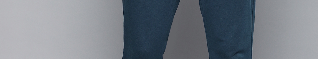 Buy One8 X PUMA Men Teal Blue Brand Logo Printed Slim Fit Regular Track ...