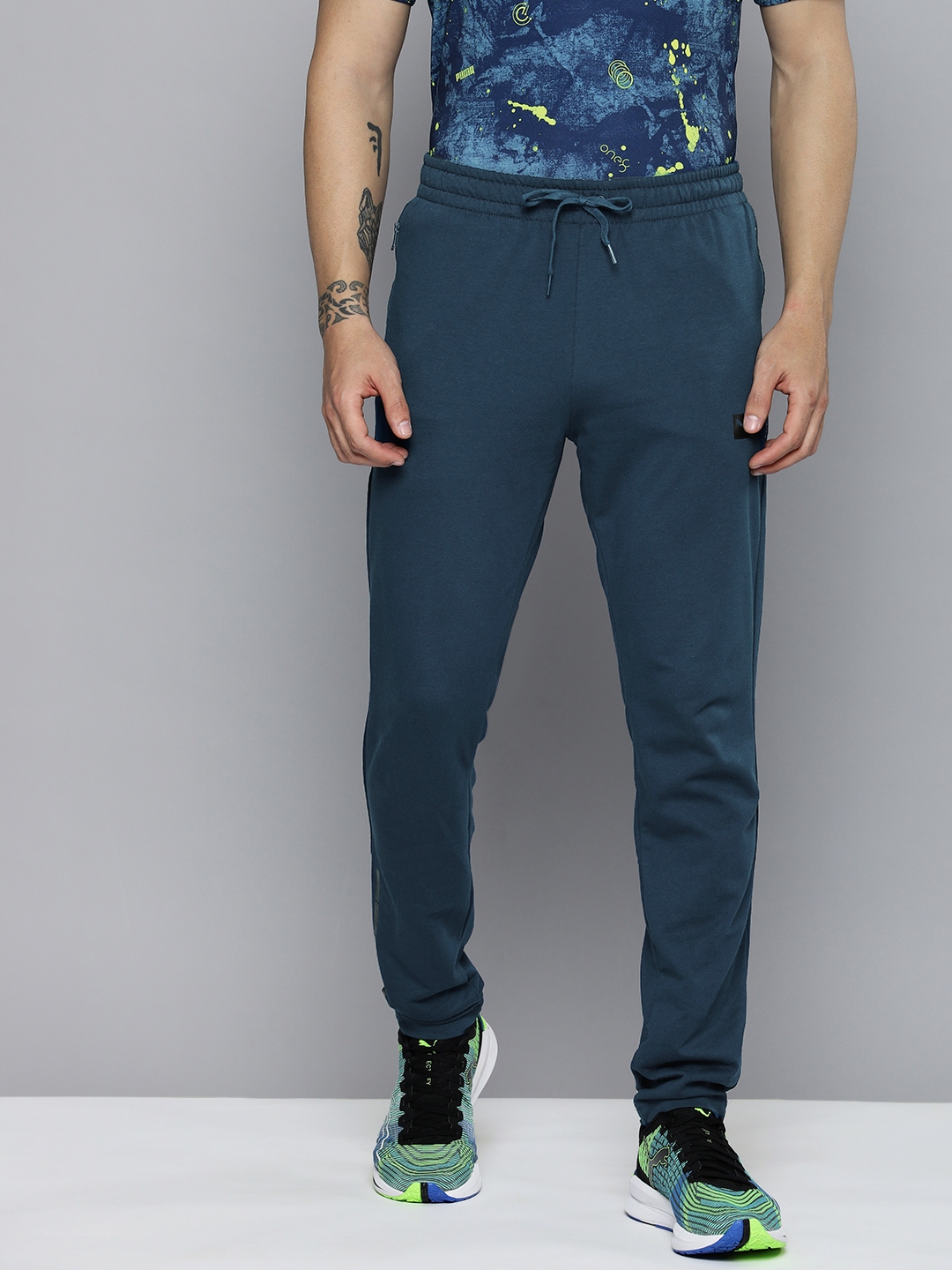 teal track pants
