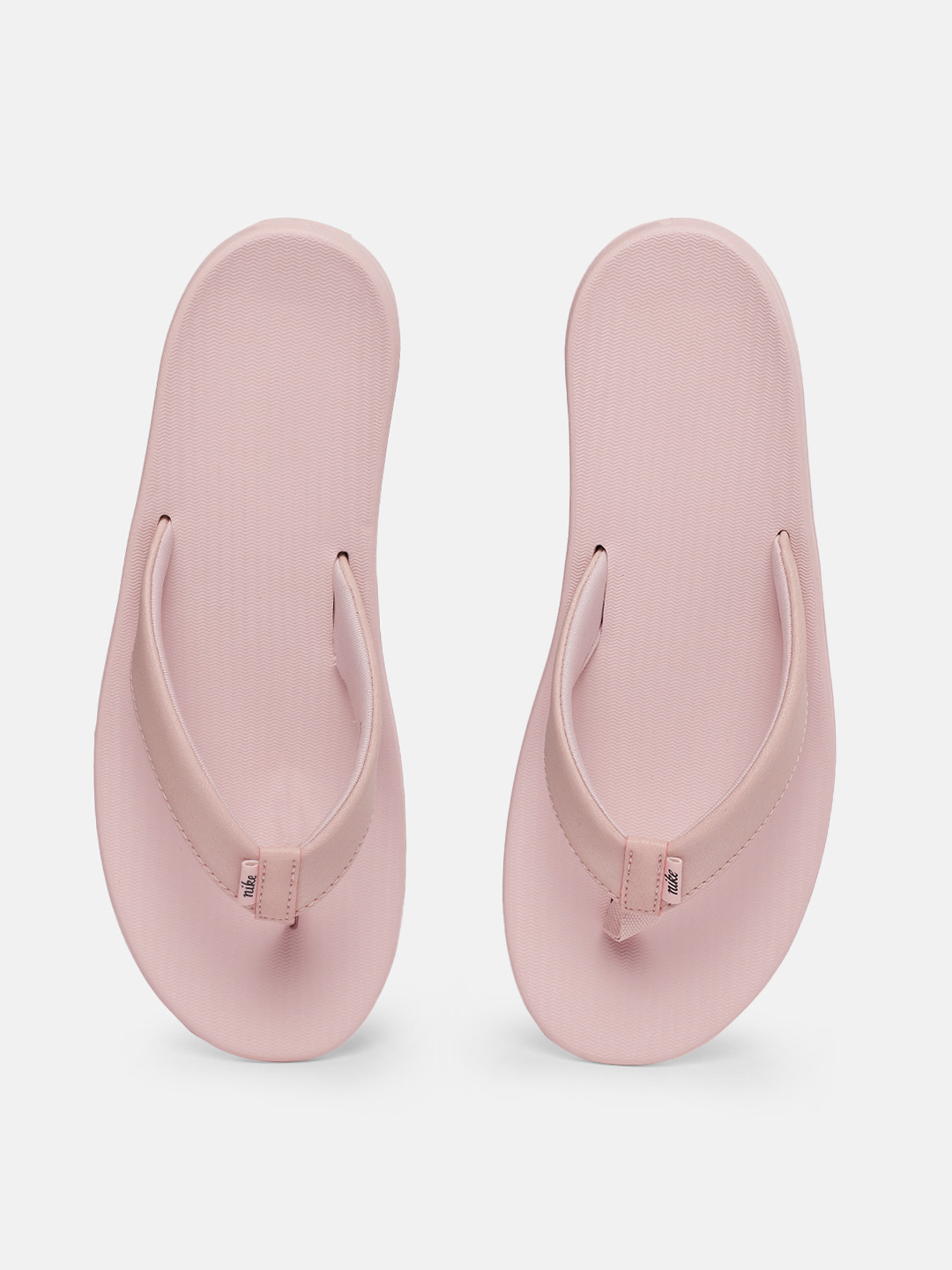 womens pink nike flip flops