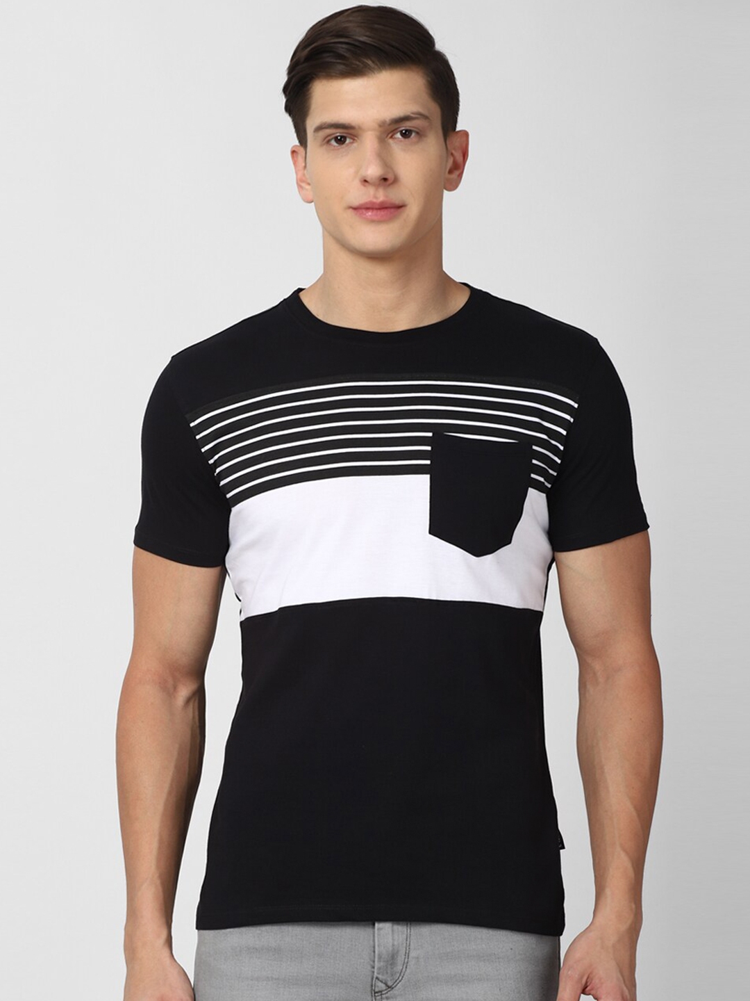 black t shirt and white pants