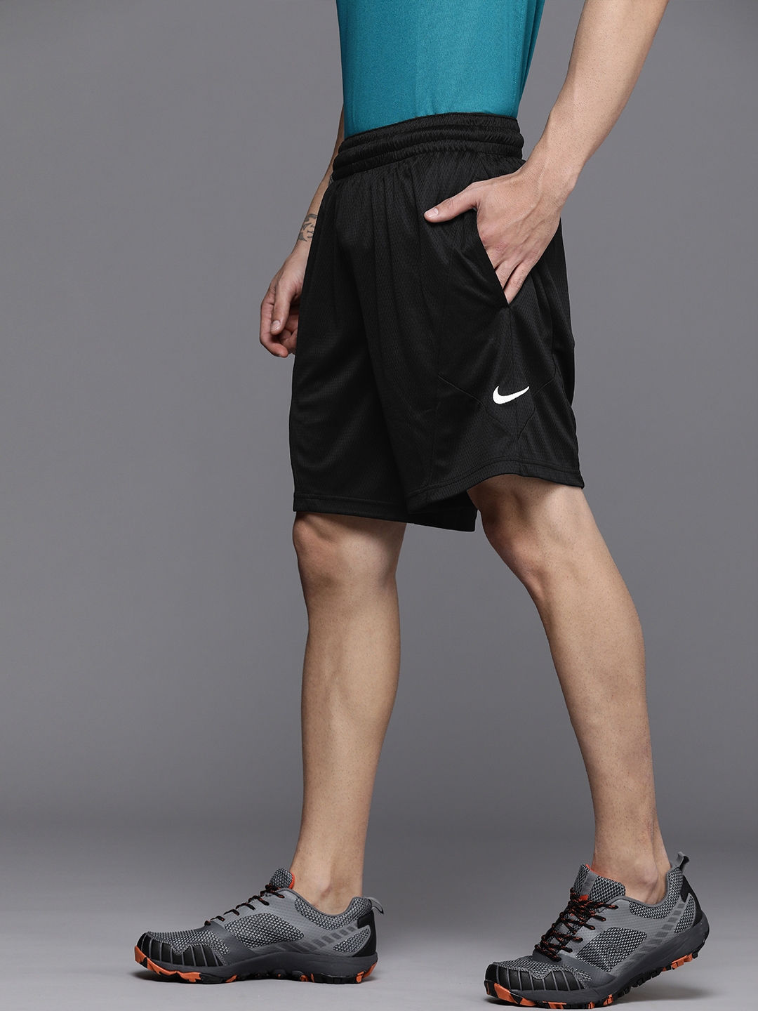 Buy Nike Men Black Self Design Loose Fit Mid Rise Dri FIT Rival ...