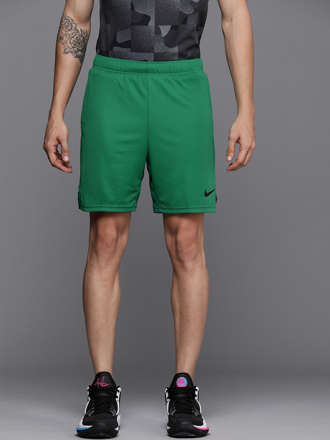 Buy Nike Men Green Solid Standard Fit Mid Rise Polyester Dri FIT Epic