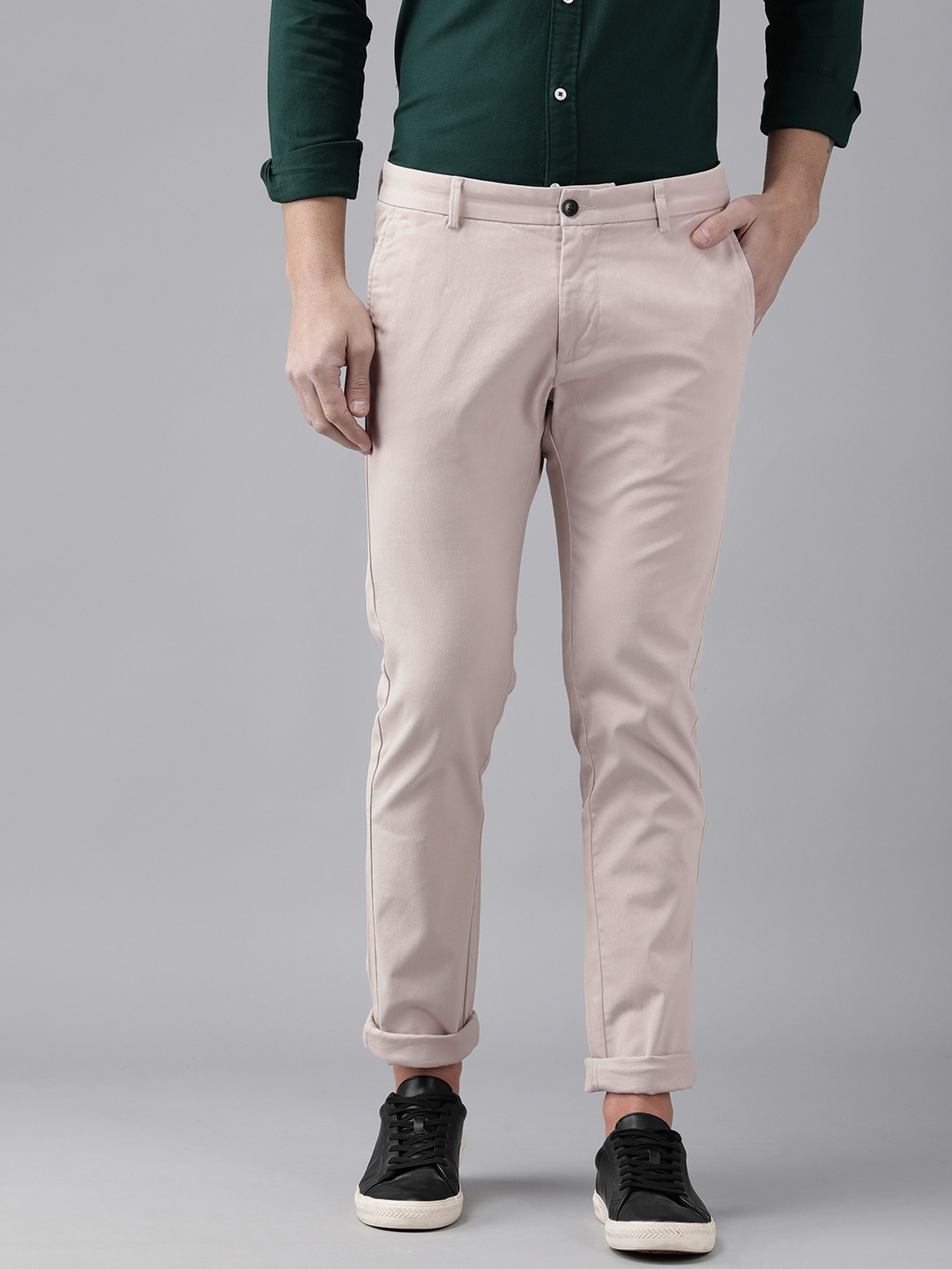 Buy Arrow Men Beige Solid Bronson Fit Chinos - Trousers for Men ...
