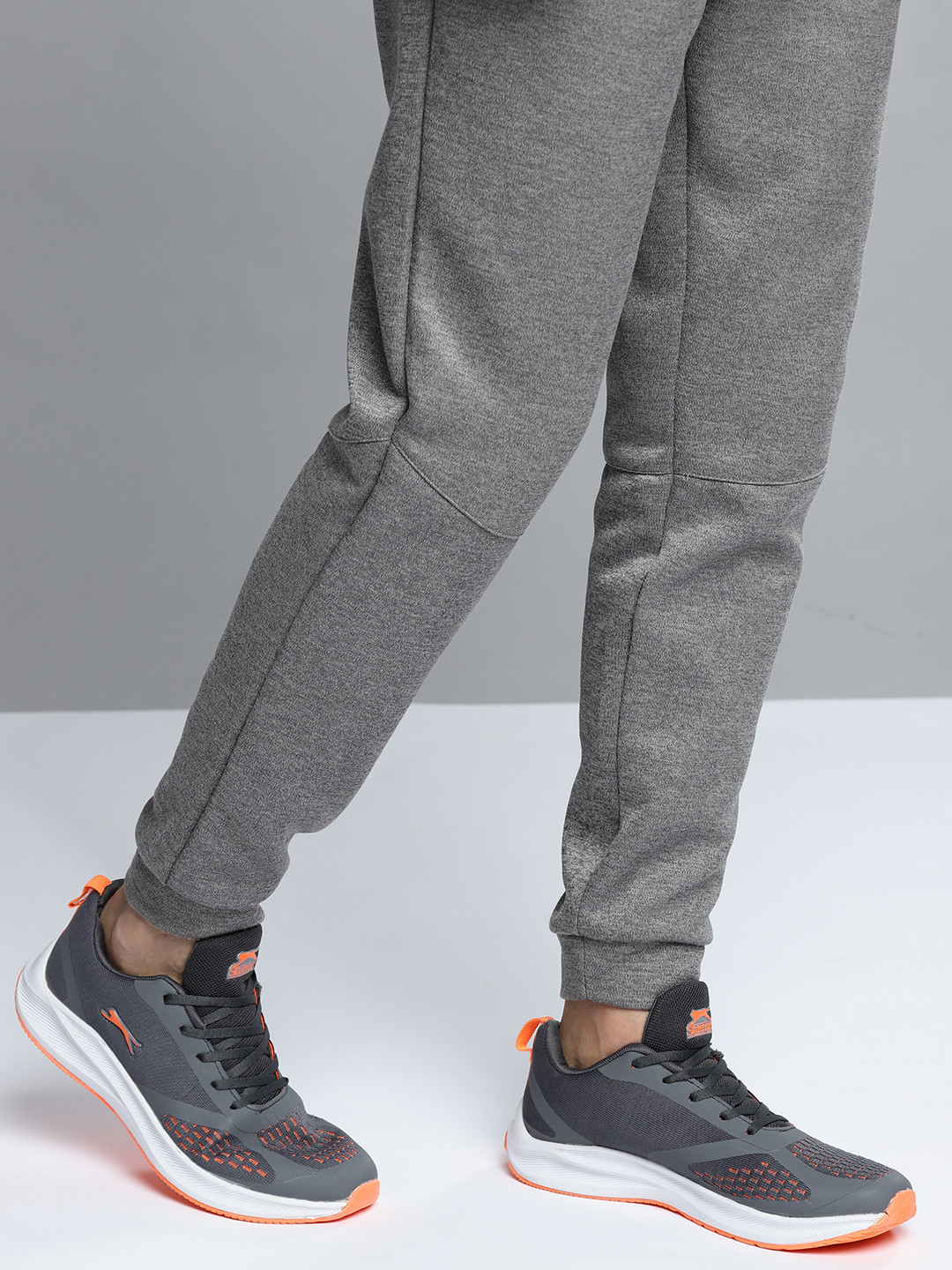 mens grey and orange trainers