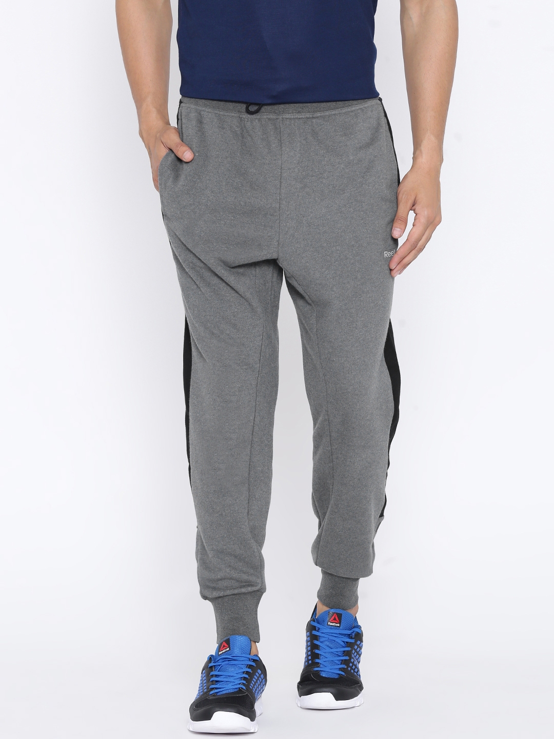 guys in grey track pants