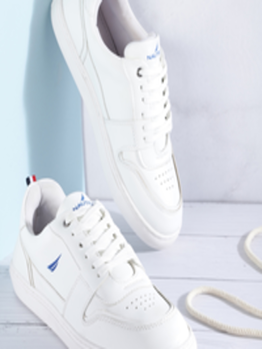 Buy Nautica Men White Solid Perforated Sneakers - Casual Shoes for Men ...