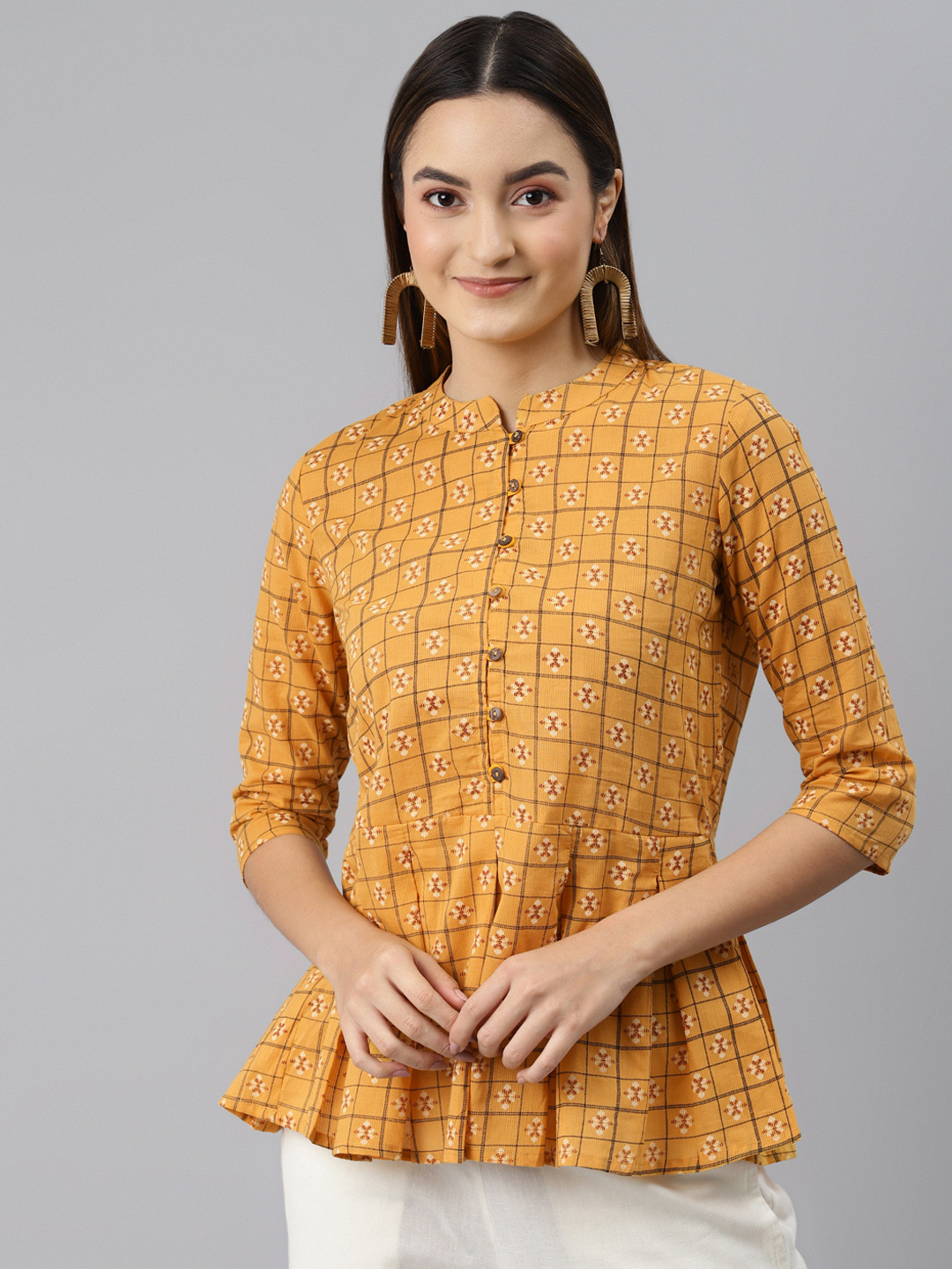 Buy MALHAAR Mustard Yellow & Beige Ethnic Motifs Printed Pleated Kurti