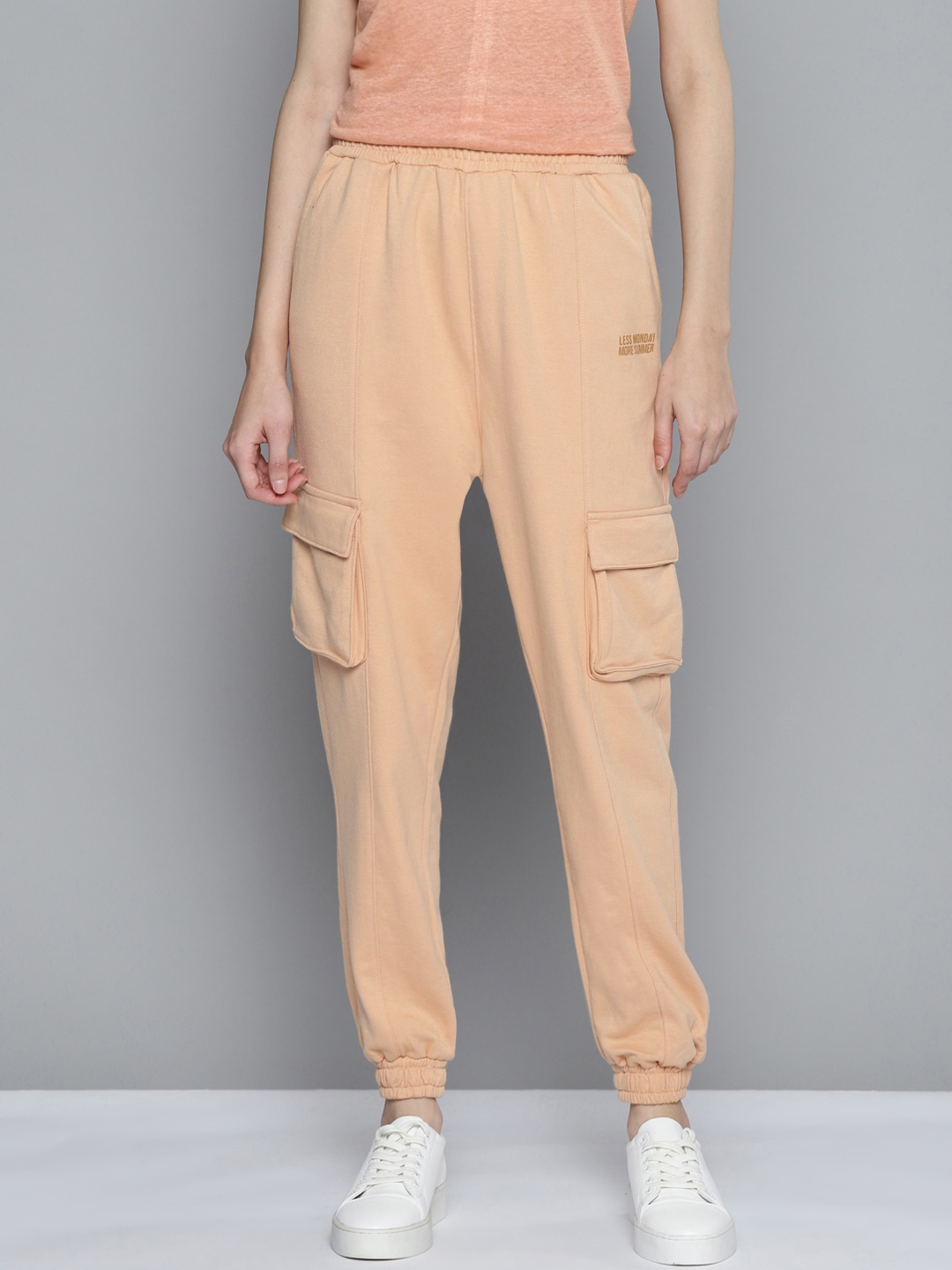 beige track pants