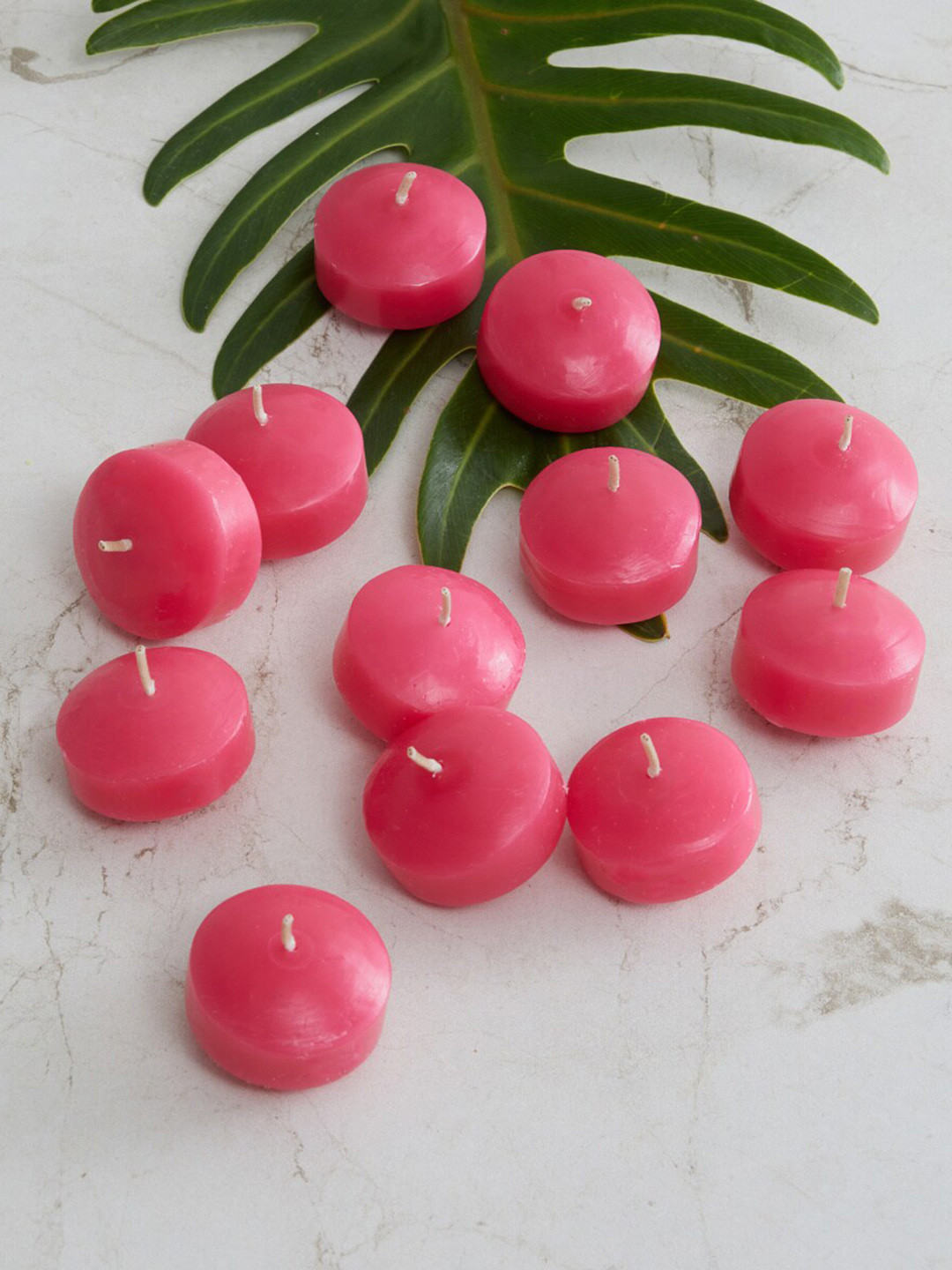 Buy Home Centre Set Of 12 Pink Floating Nuggets T Light Candles