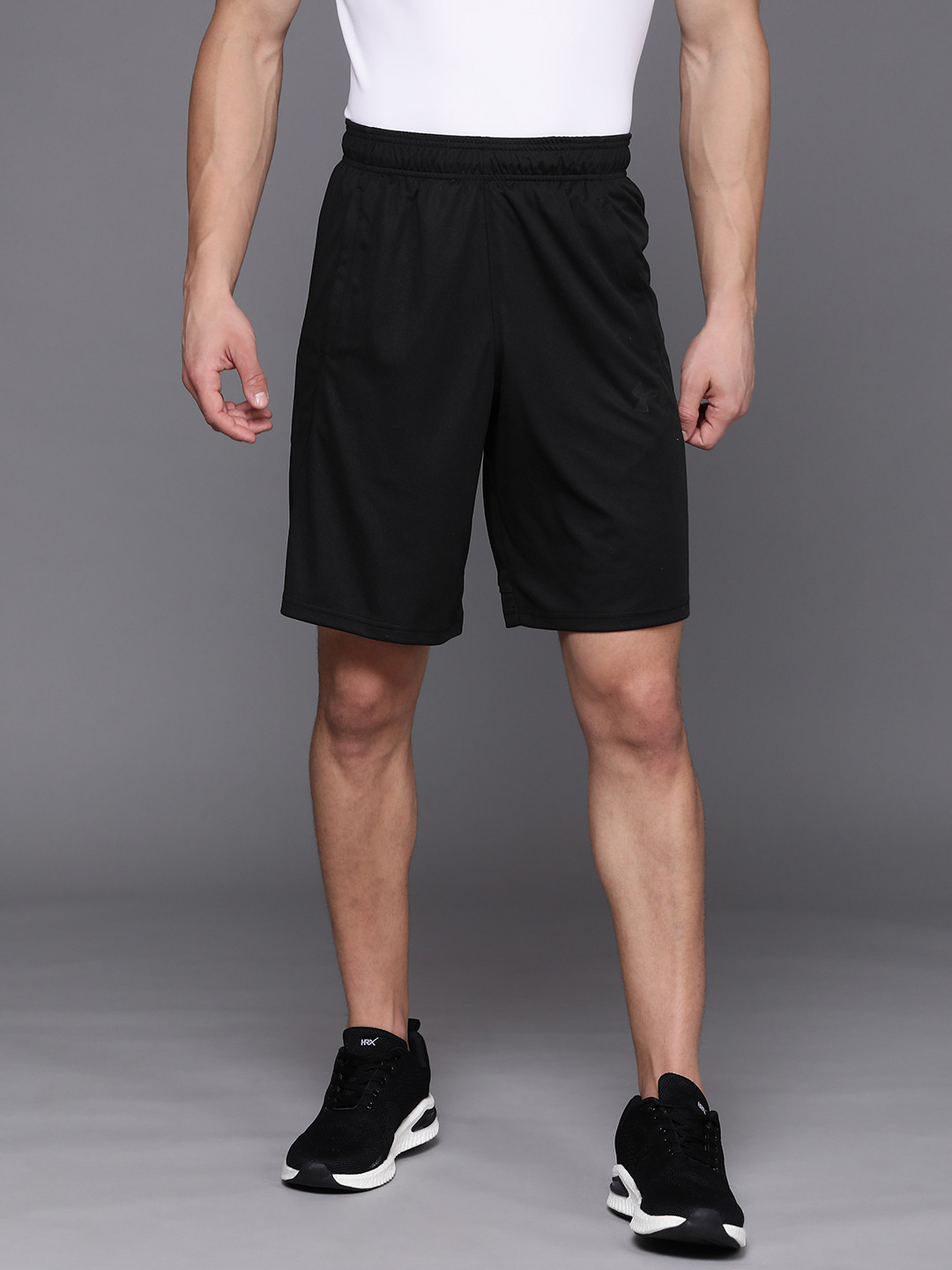 Buy UNDER ARMOUR Men Black Solid Baseline 10" Shorts Shorts for Men