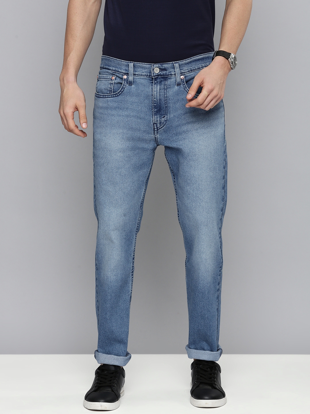 Buy Levis Men Blue Tapered Fit Heavy Fade Stretchable Casual Jeans ...