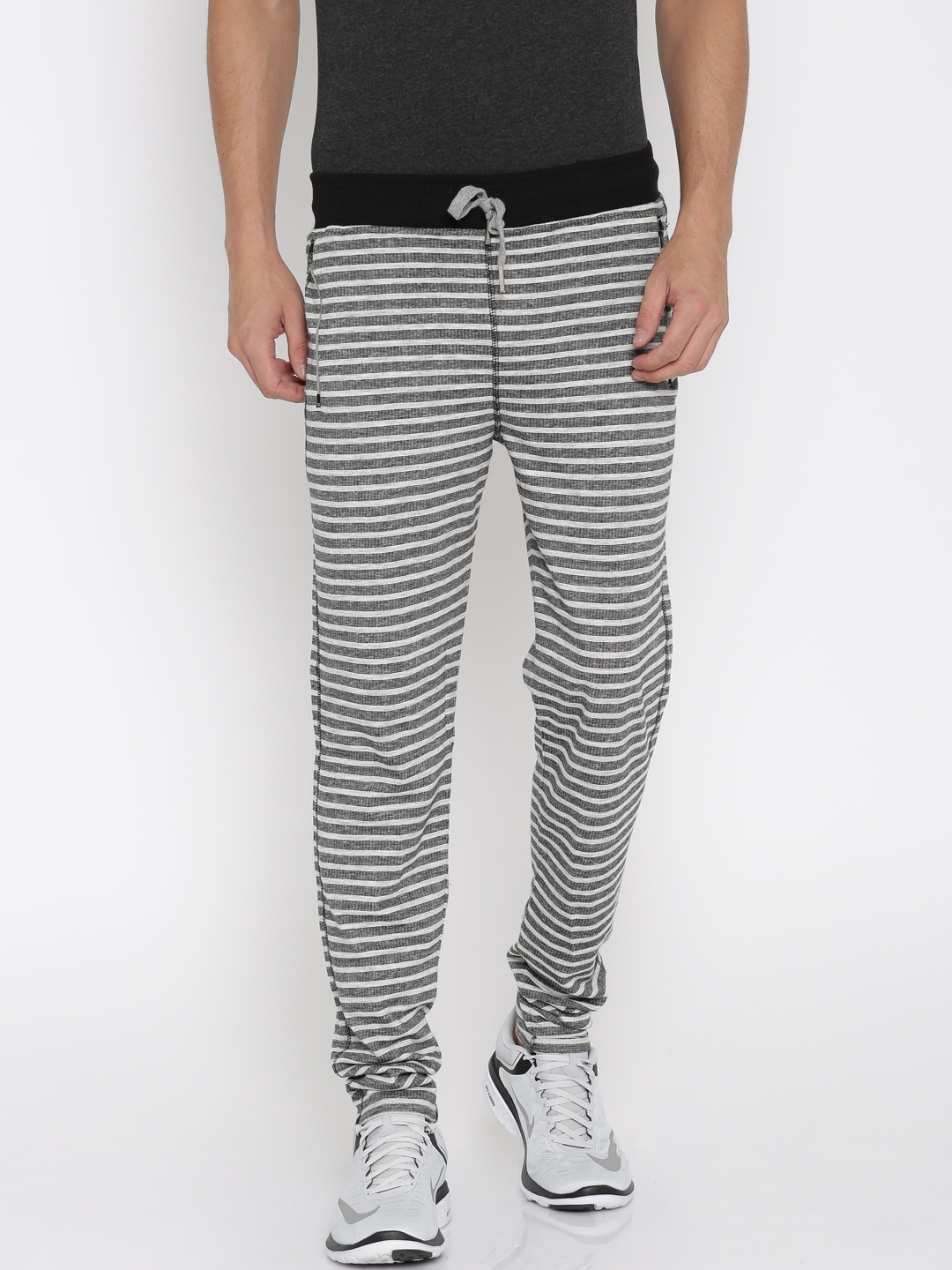 black and grey track pants