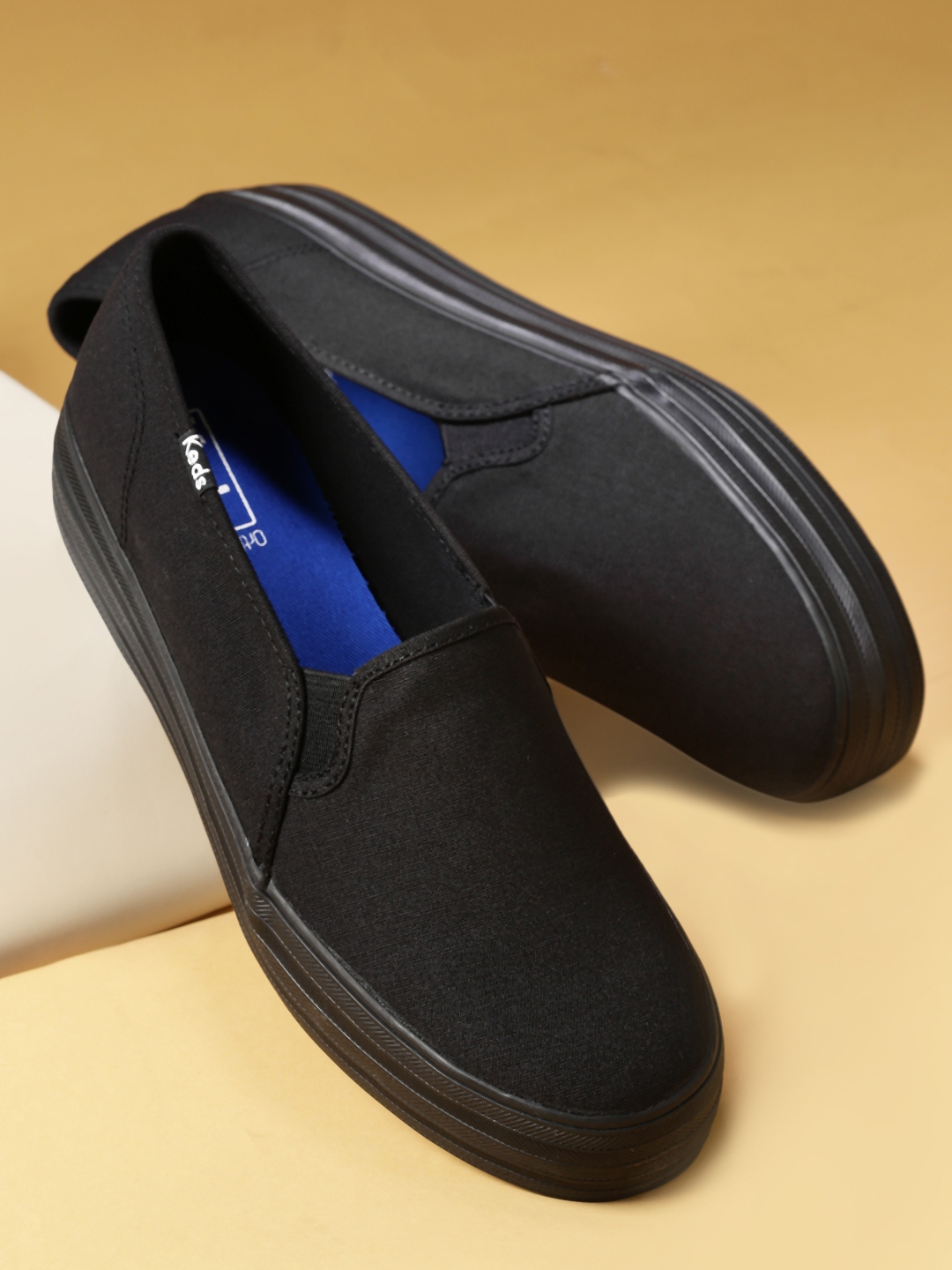 keds triple decker leather slip on