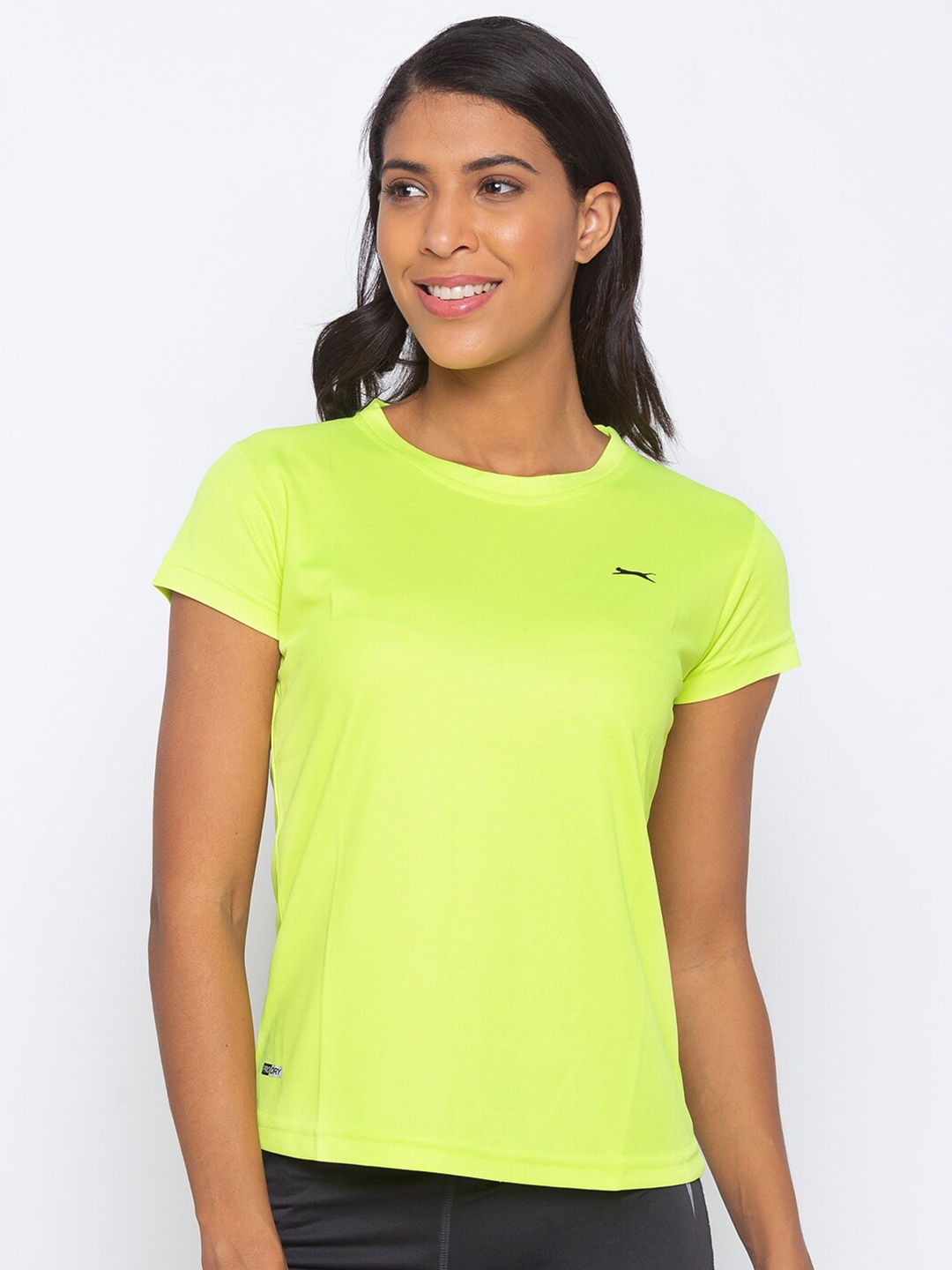 black t shirt green pants