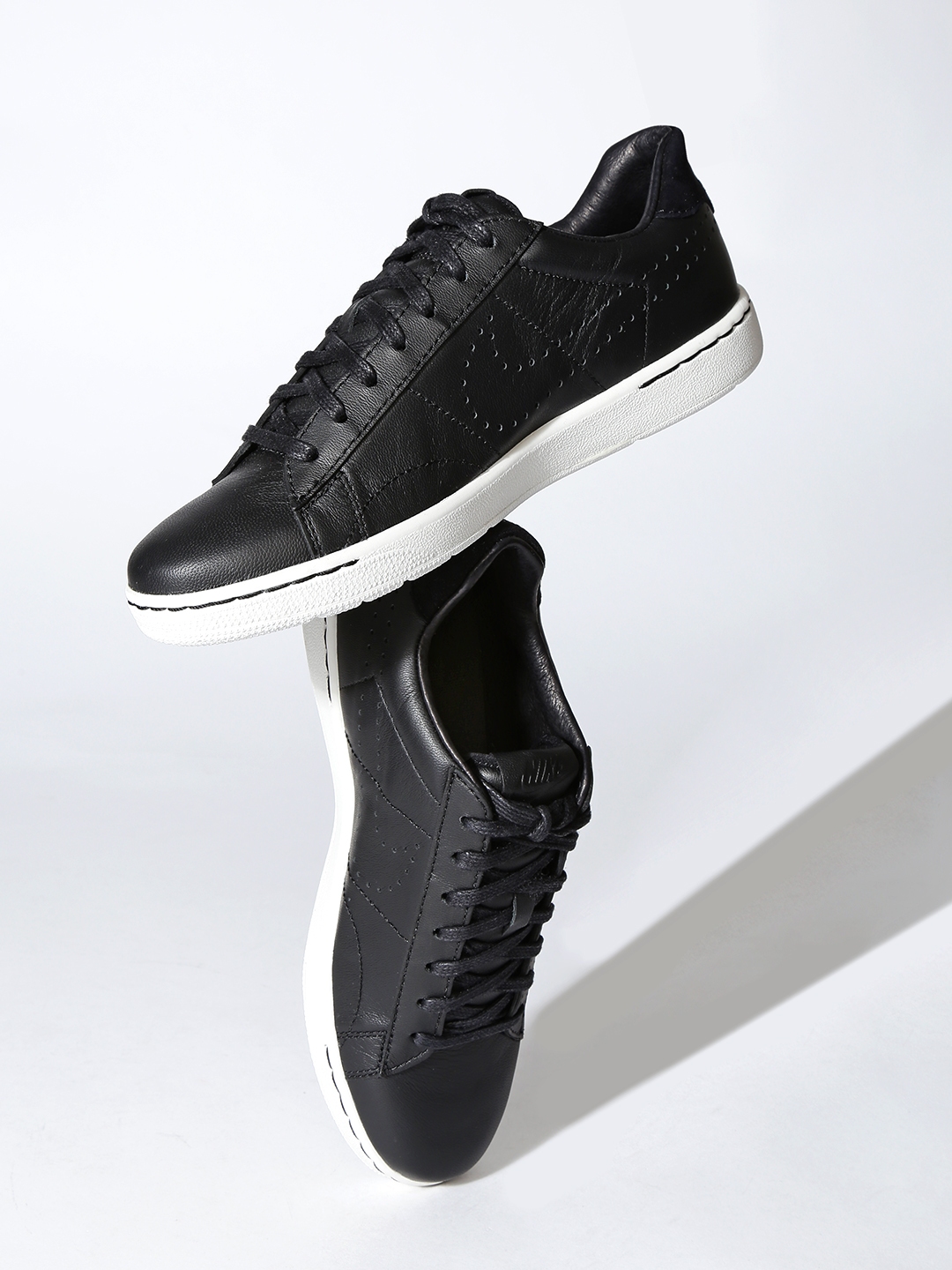 nike tennis leather sneakers