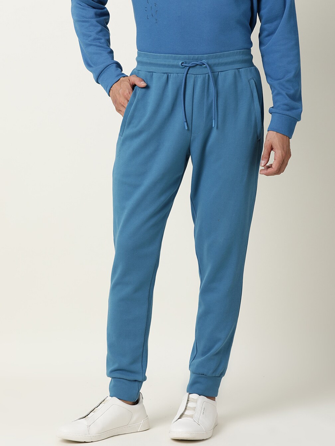 teal track pants