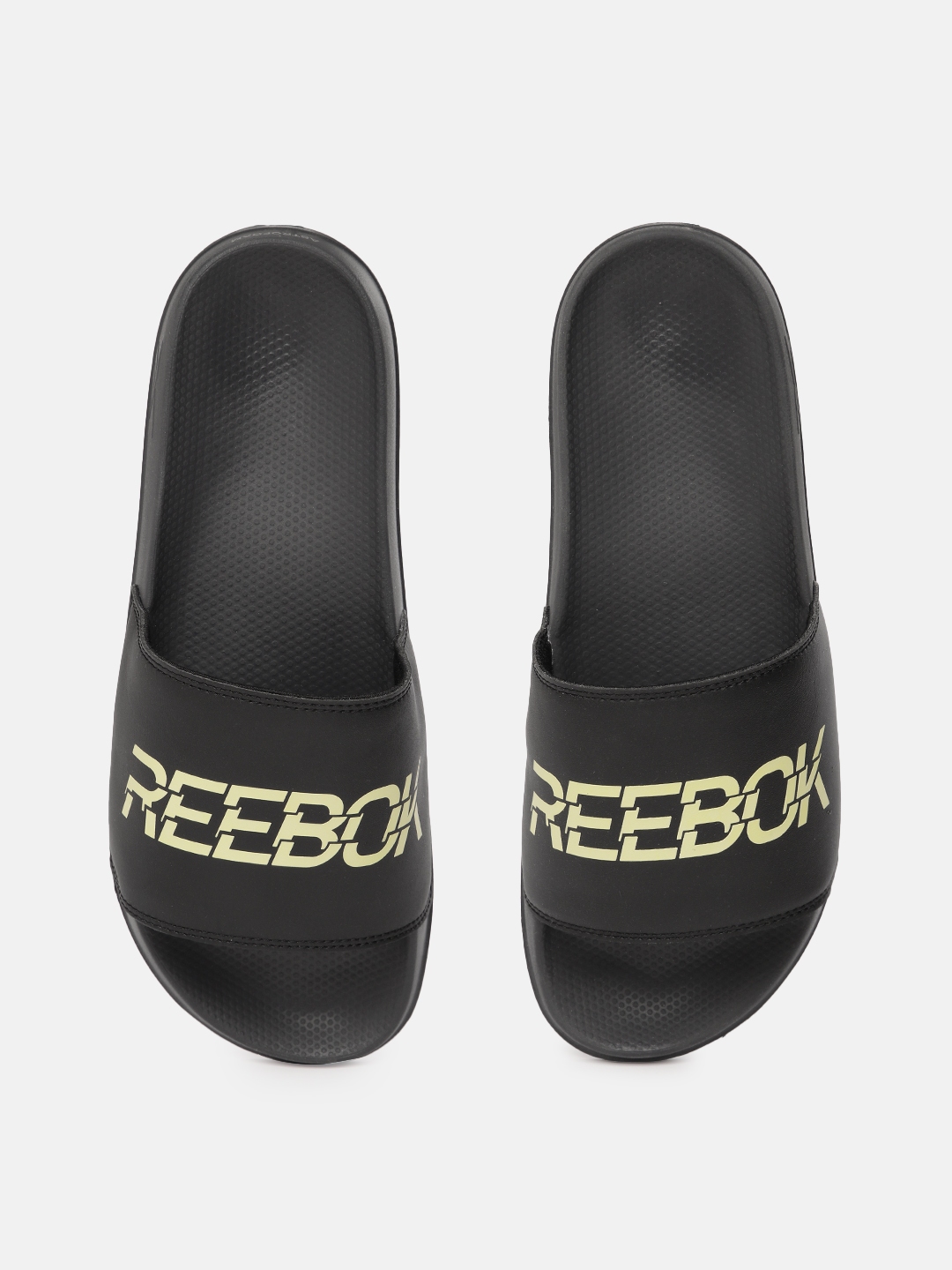 Buy Reebok Unisex Printed Vector Sliders - Flip Flops for Unisex ...