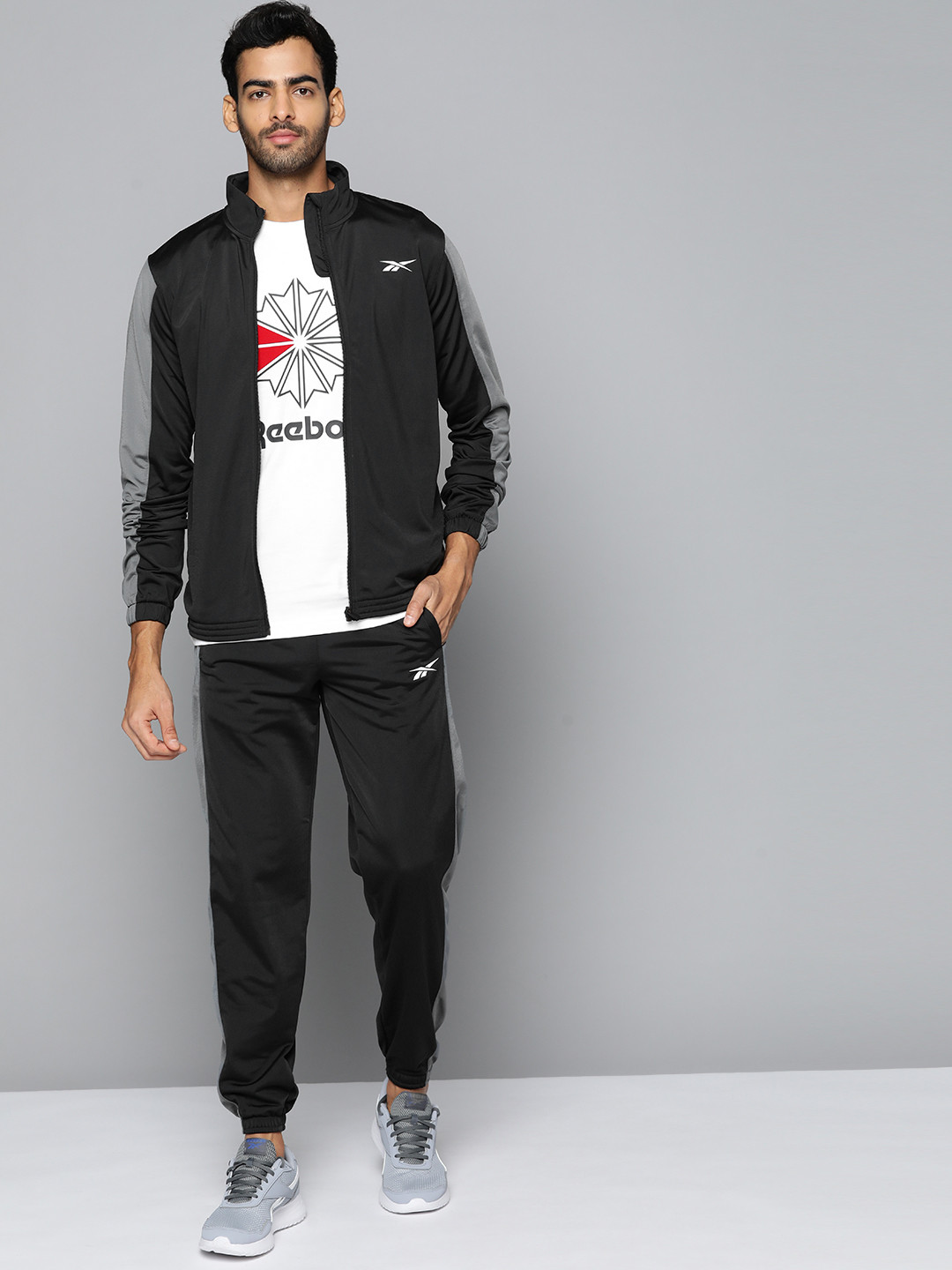 Buy Reebok Men Black Solid Workout Tricot Tracksuits Tracksuits for