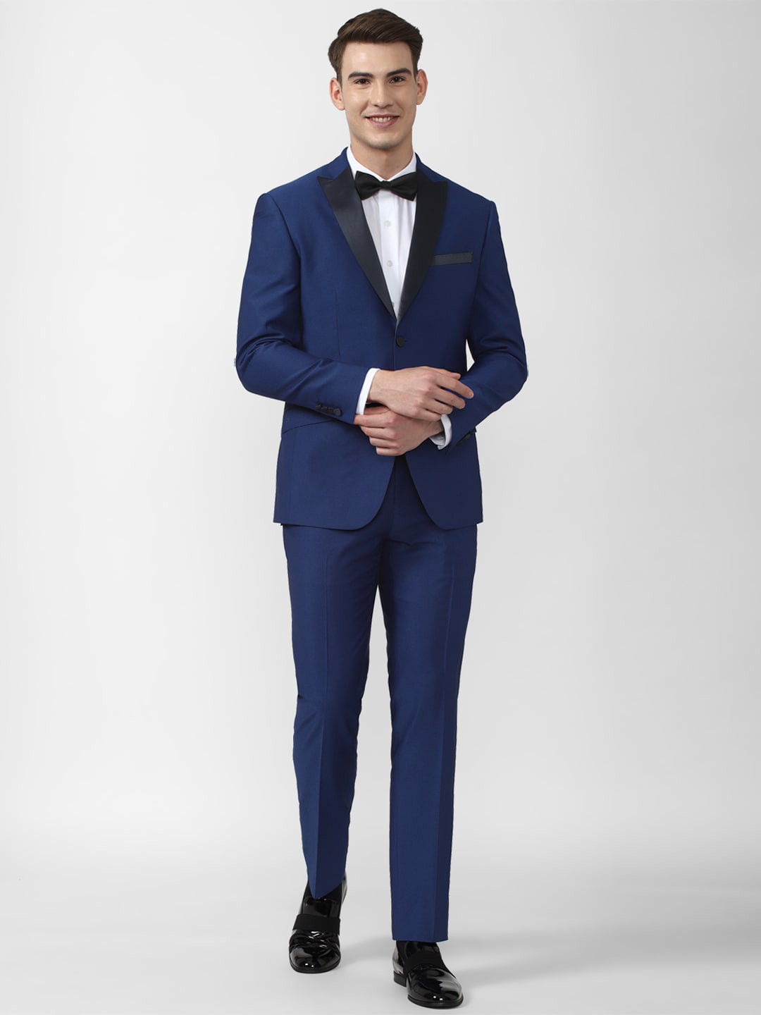 Buy Peter England Elite Men Navy Blue Solid Single Breasted Slim Fit 2 ...