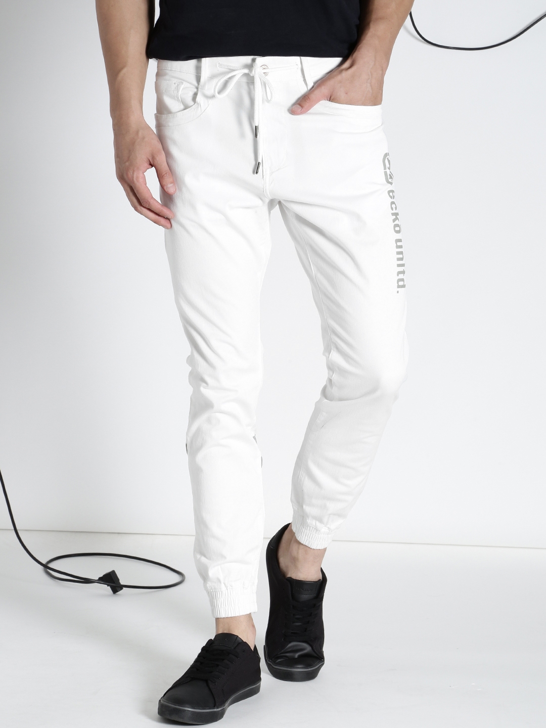 Buy Ecko Unltd Men White Regular Fit Solid Joggers - Trousers for Men ...