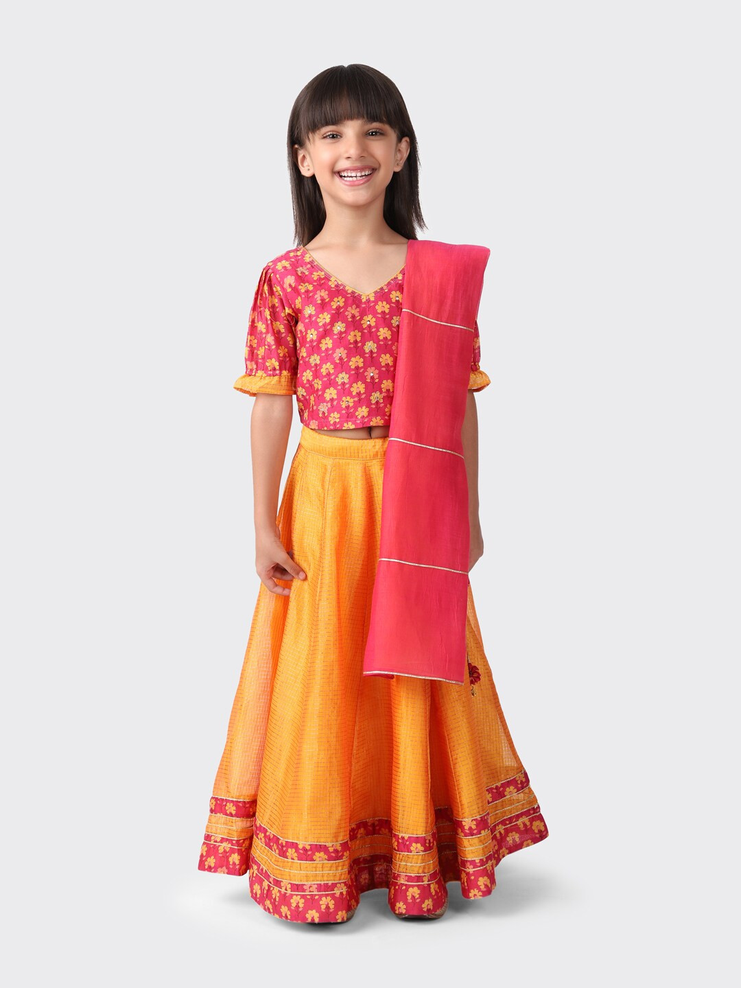 Girls Bright Orange Bandhani Printed Lehenga Choli Set with Net Dupatta