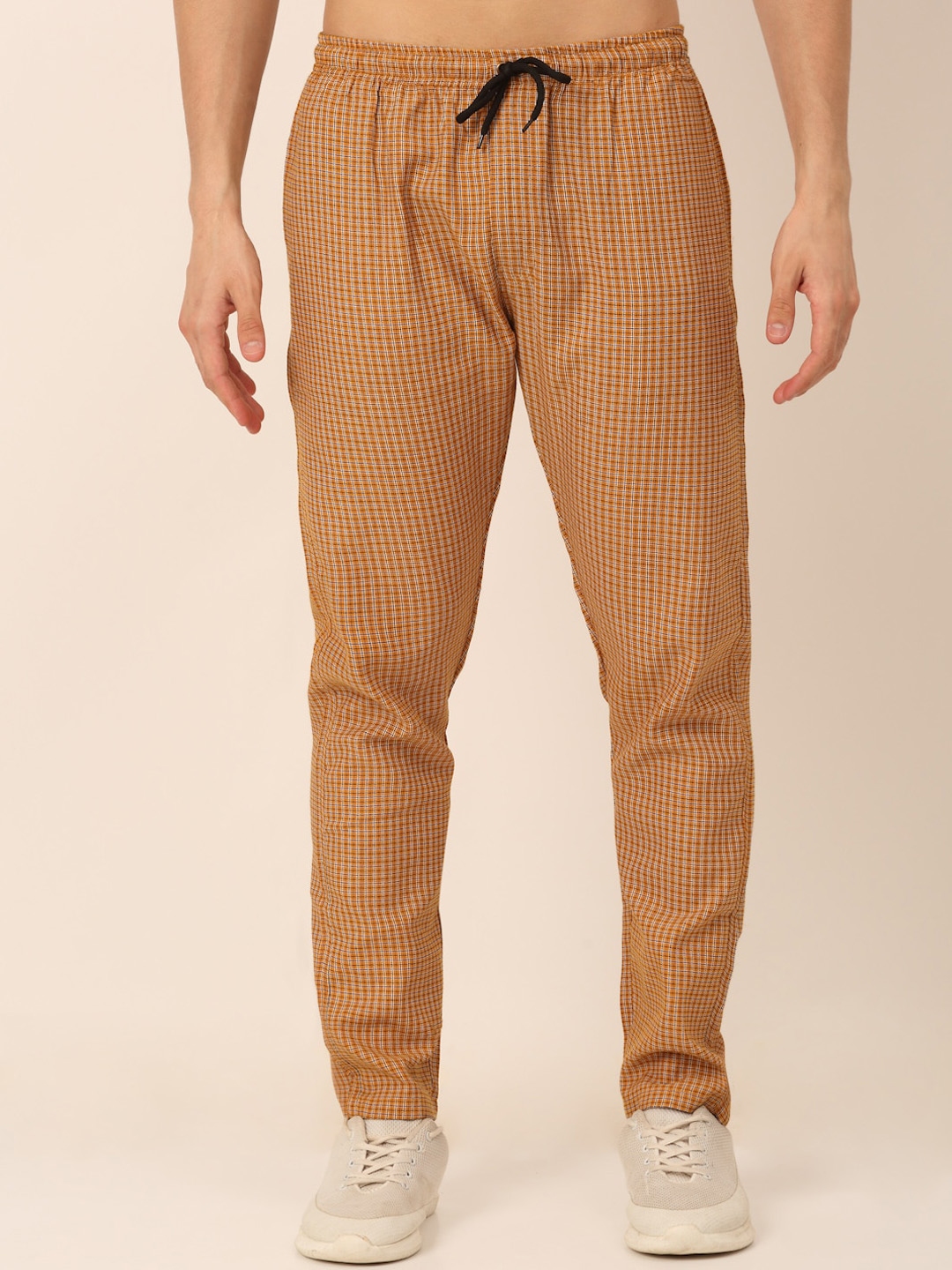 mustard track pants