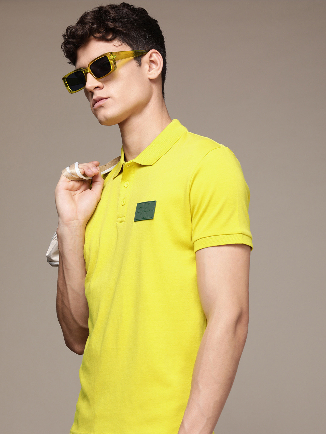 Buy Calvin Klein Jeans Men Yellow Solid Polo Collar Brand Logo Applique