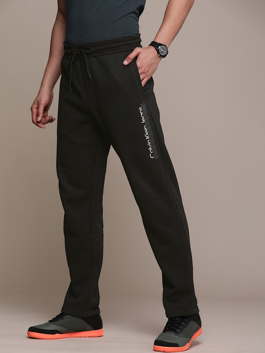 Buy Calvin Klein Jeans Men Black Solid Track Pants With Logo Print