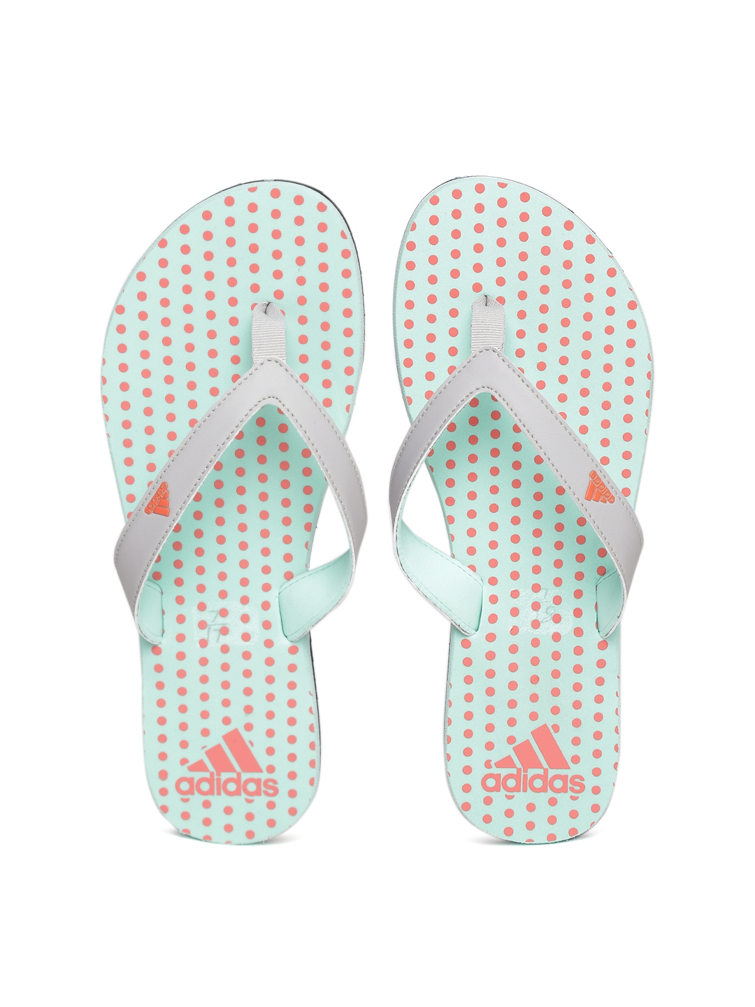 mint green nike flip flops