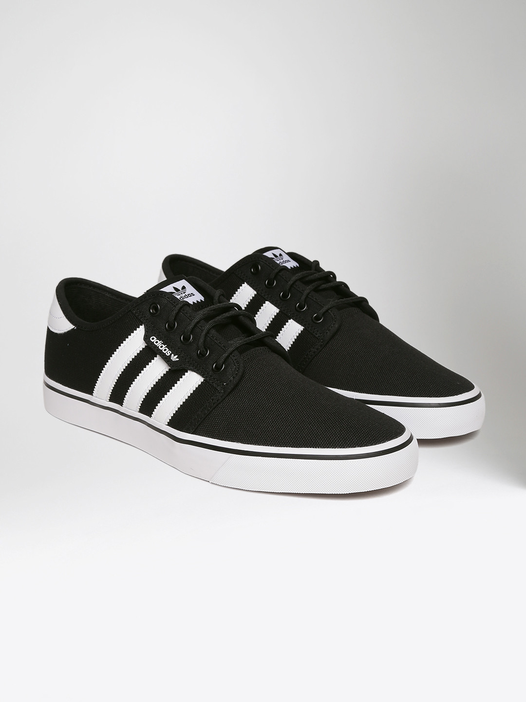 all black adidas seeley