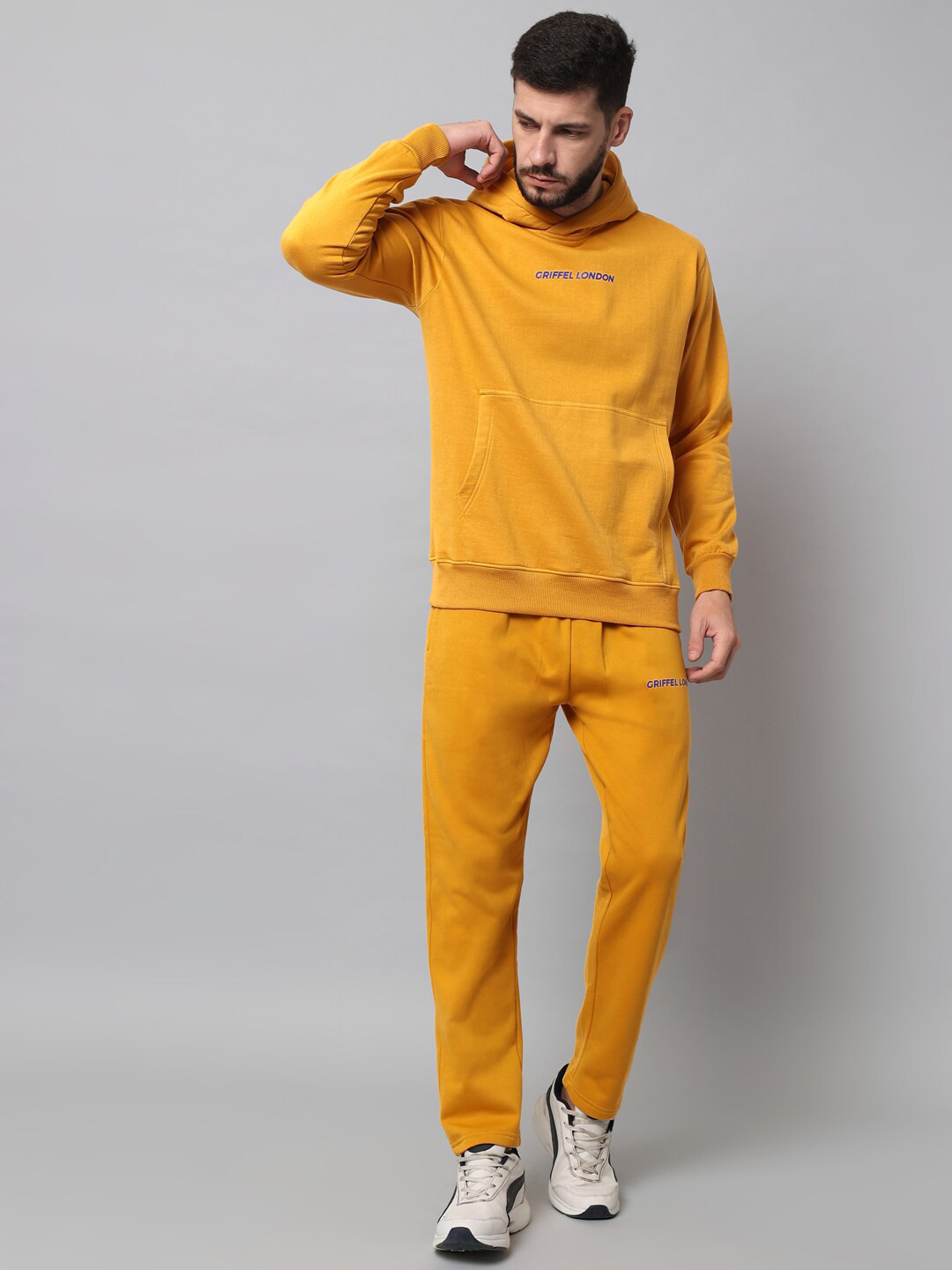 Buy GRIFFEL Men Mustard Coloured Solid Hooded Tracksuits Tracksuits
