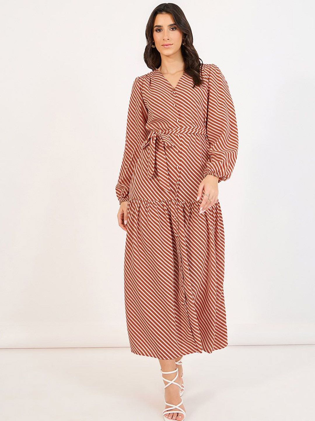 Indulge in Timeless Striped Print Puff Sleeve Pocketed Wavy Maxi Dress