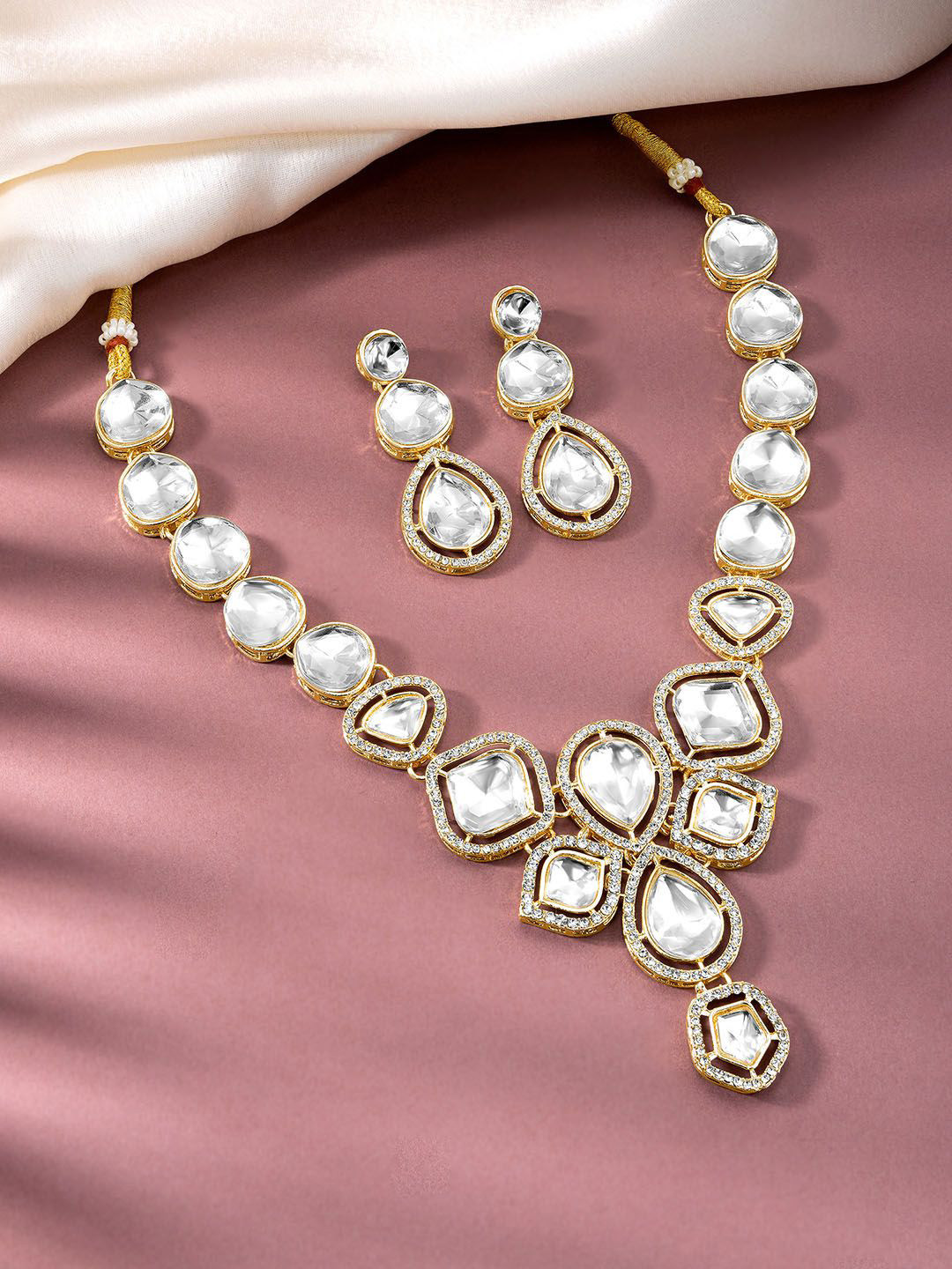 Women Gold Plated Ruby & Cubic Zirconia Studded Jewellery Set