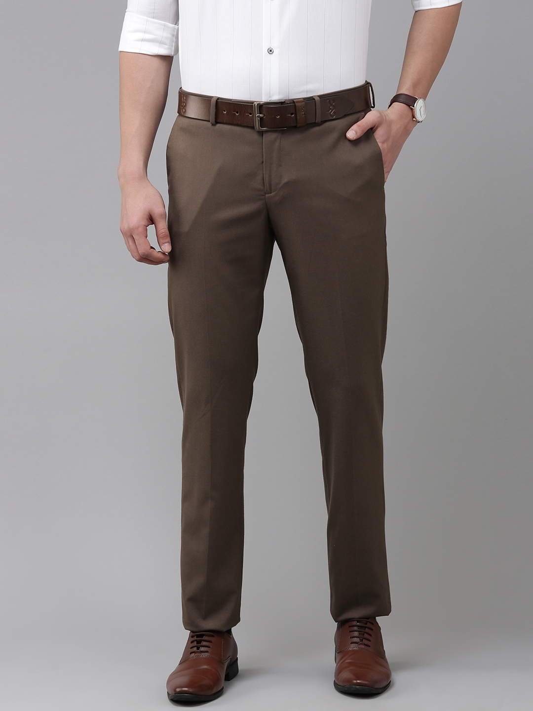 Buy Arrow Men Brown Solid Smart Fit Mid Rise Plain Woven Flat Front ...