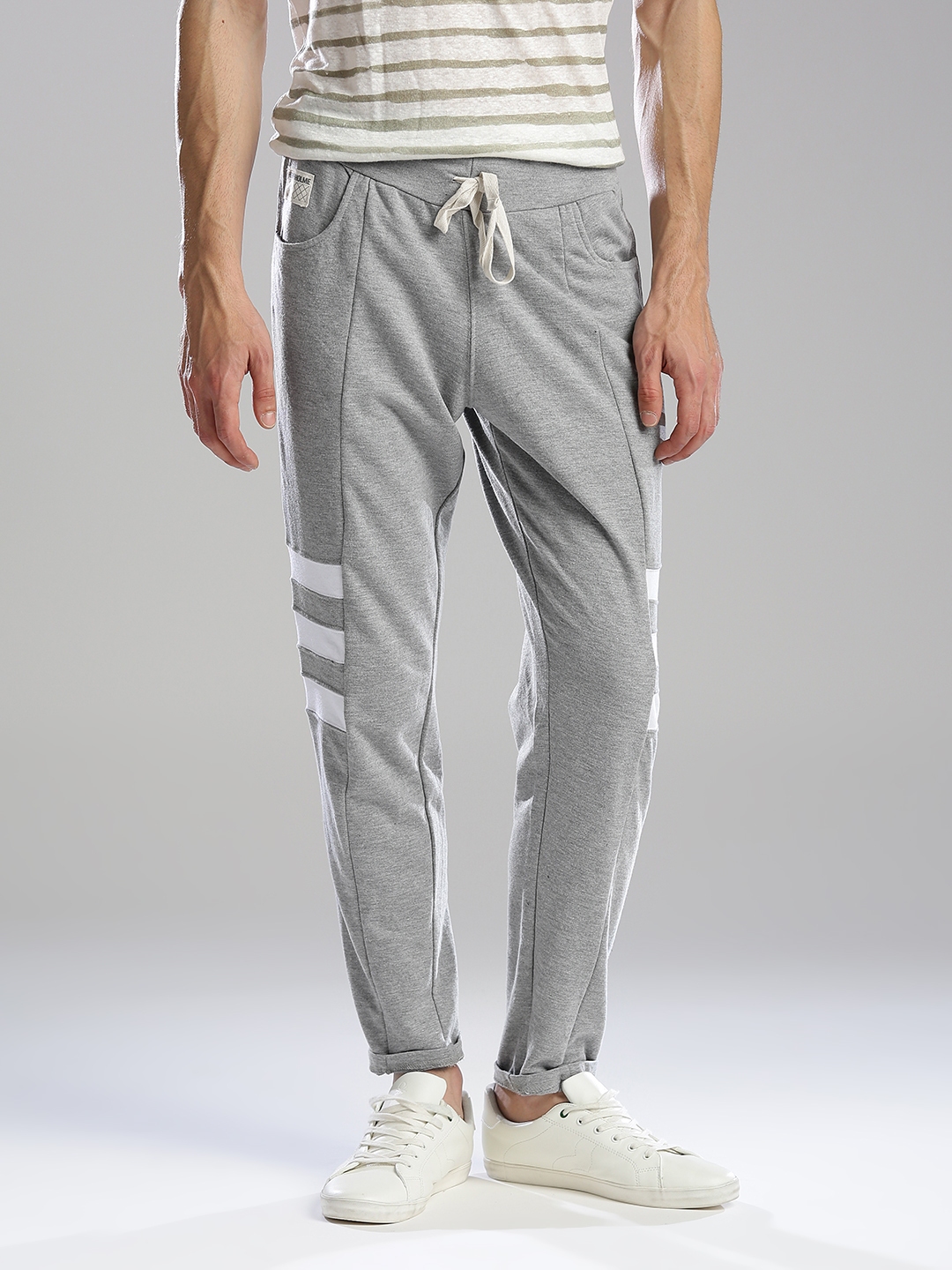 guys in grey track pants