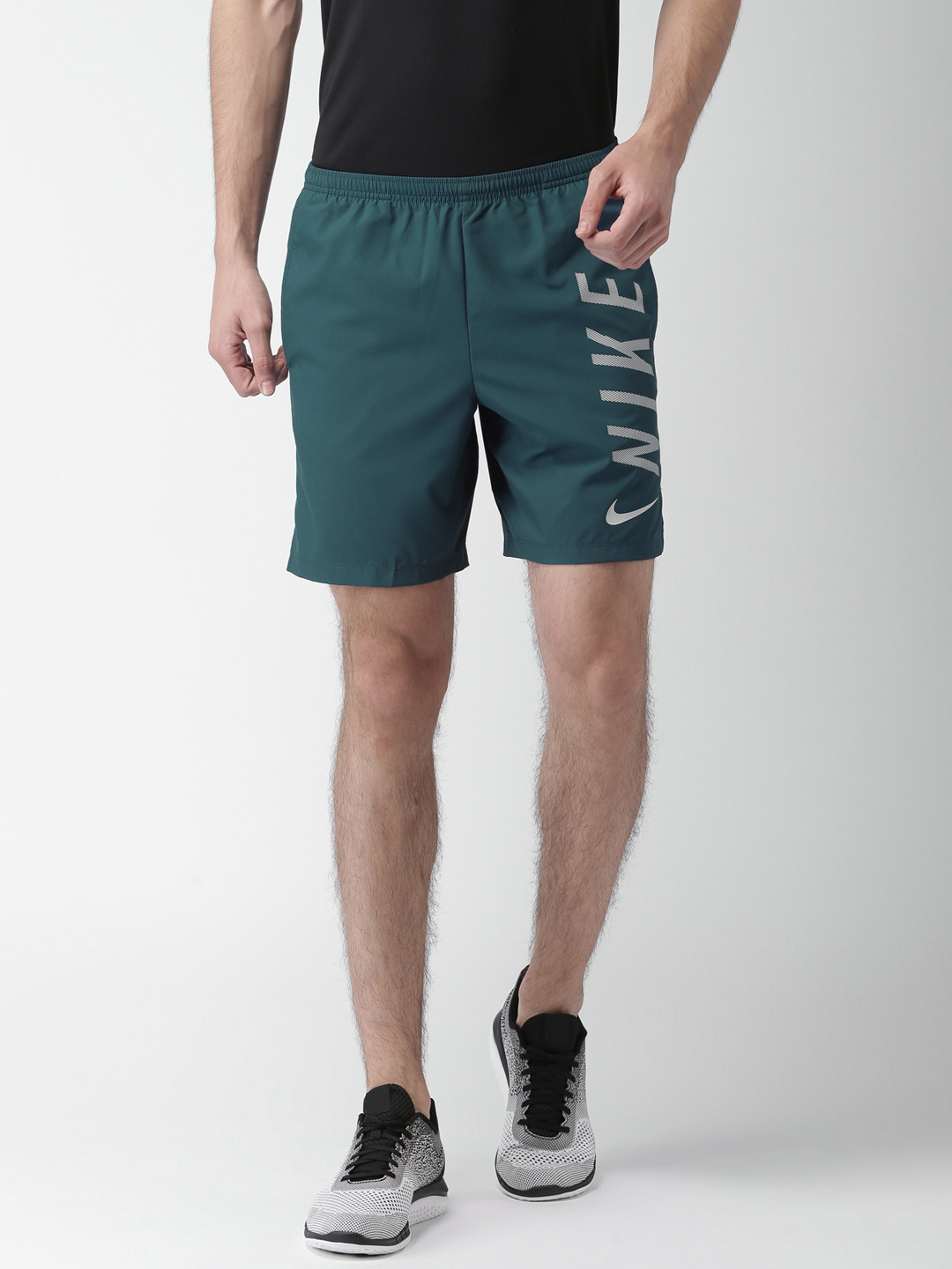 teal nike running shorts