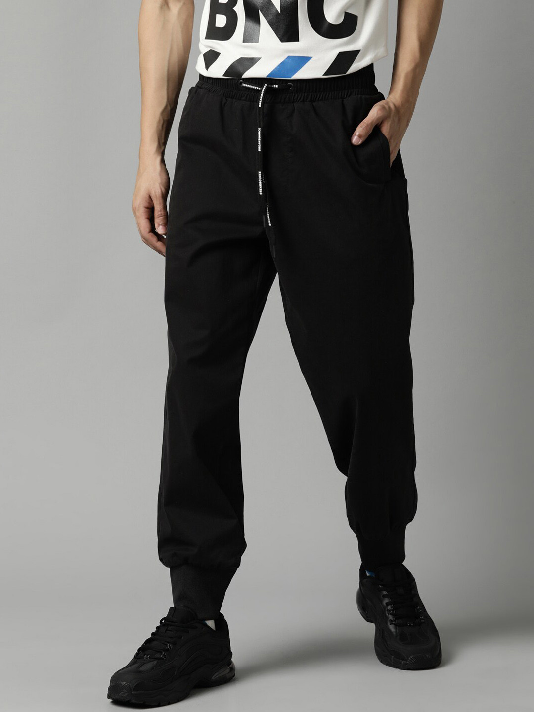 Buy Breakbounce Men Black Solid Loose Fit Cotton Joggers Trousers for