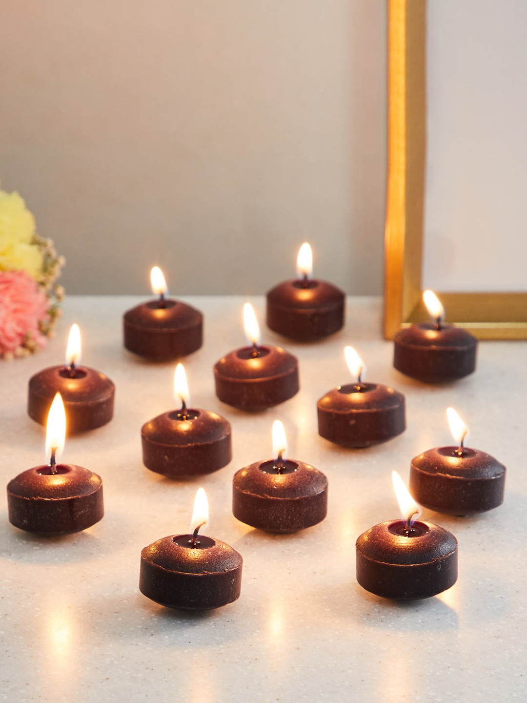 Buy Home Centre Set Of 12 Musk Scented Floating Candles Candles for