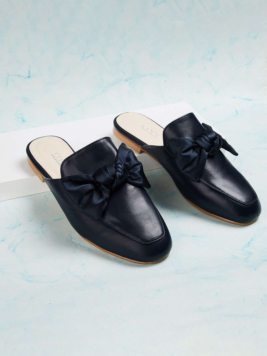 navy mule shoes