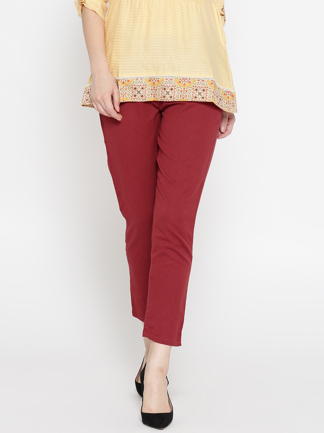 brick red trousers