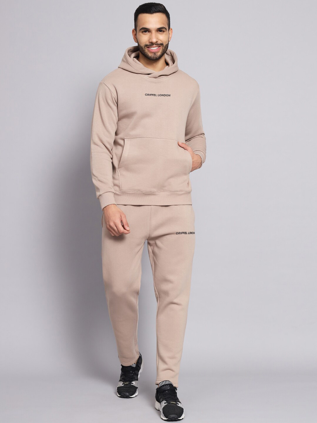 Buy GRIFFEL Men Beige Self Designed Hooded Sports Tracksuits