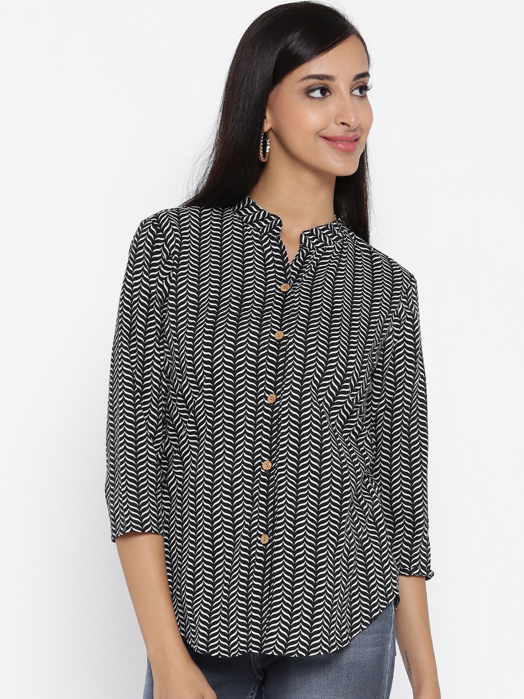 white and black printed shirt