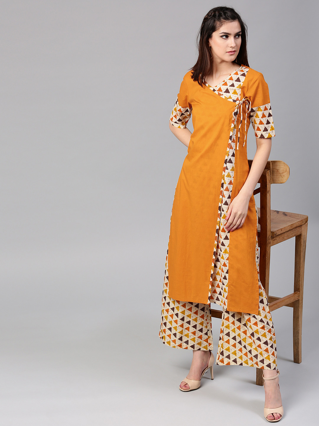 Aks women mustard solid straight kurta Clearance