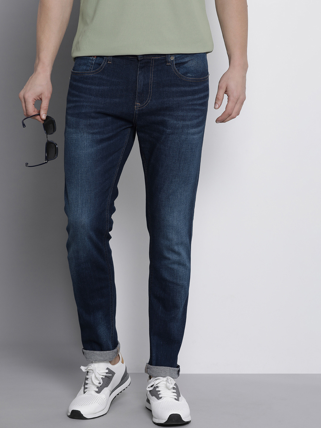 Buy Tommy Hilfiger Men Tapered Fit Light Fade Stretchable Jeans Jeans