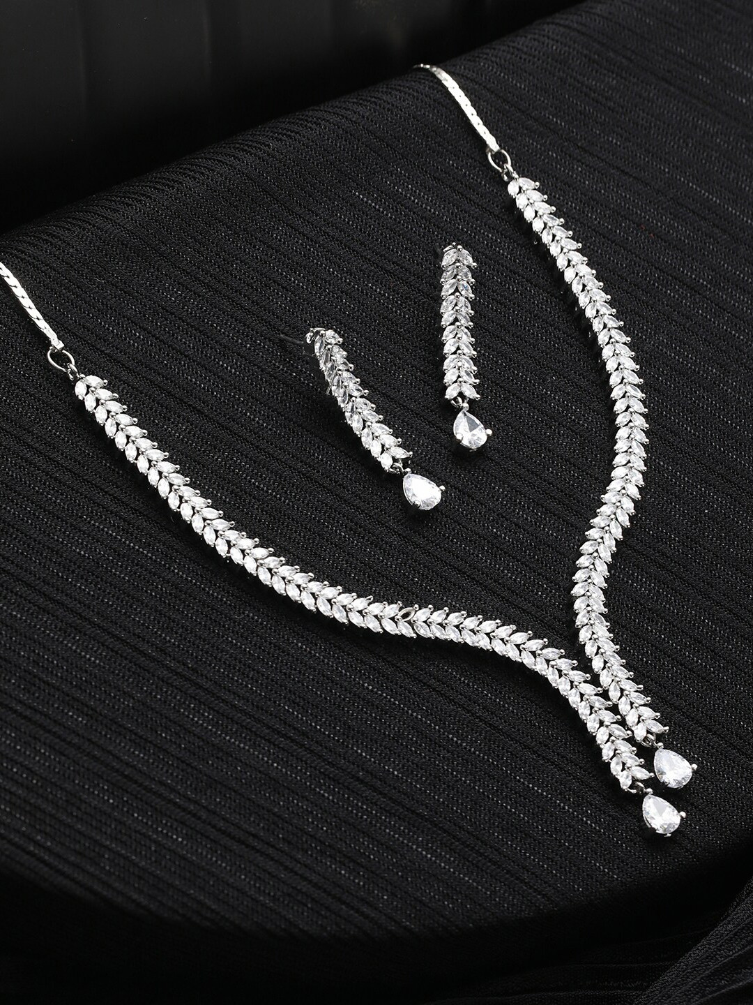 Buy Priyaasi Women Silver Plated AD Studded & Beaded Leaf Shaped