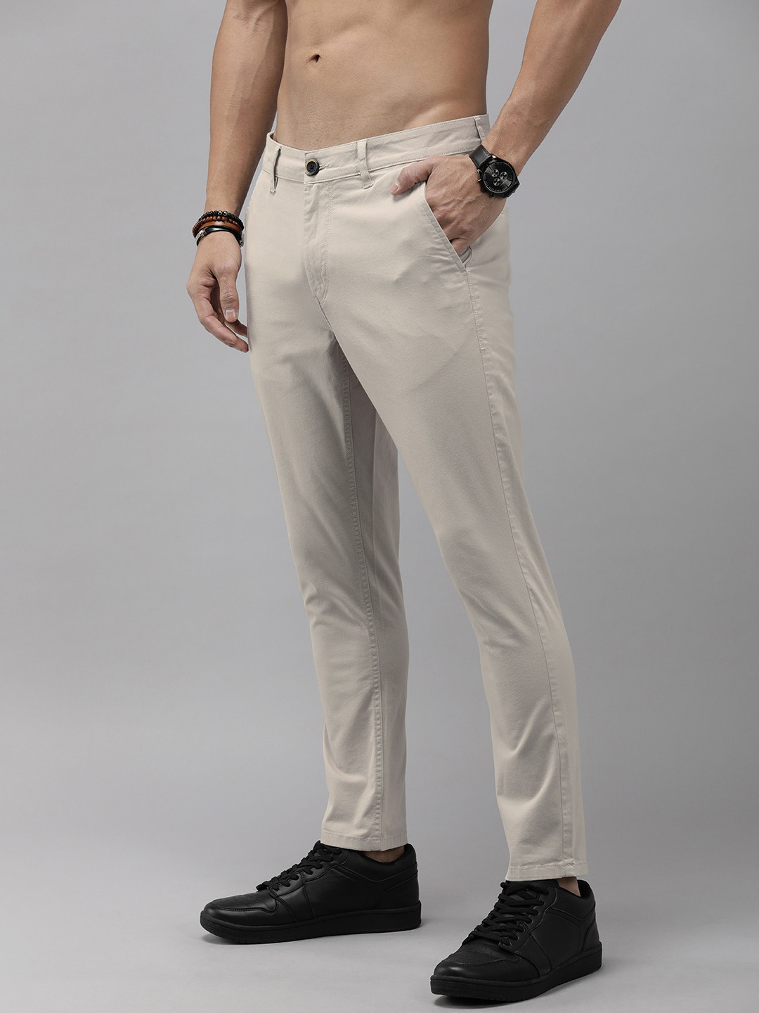 Buy The Roadster Life Co. Men Solid Tapered Fit Chinos Trousers ...